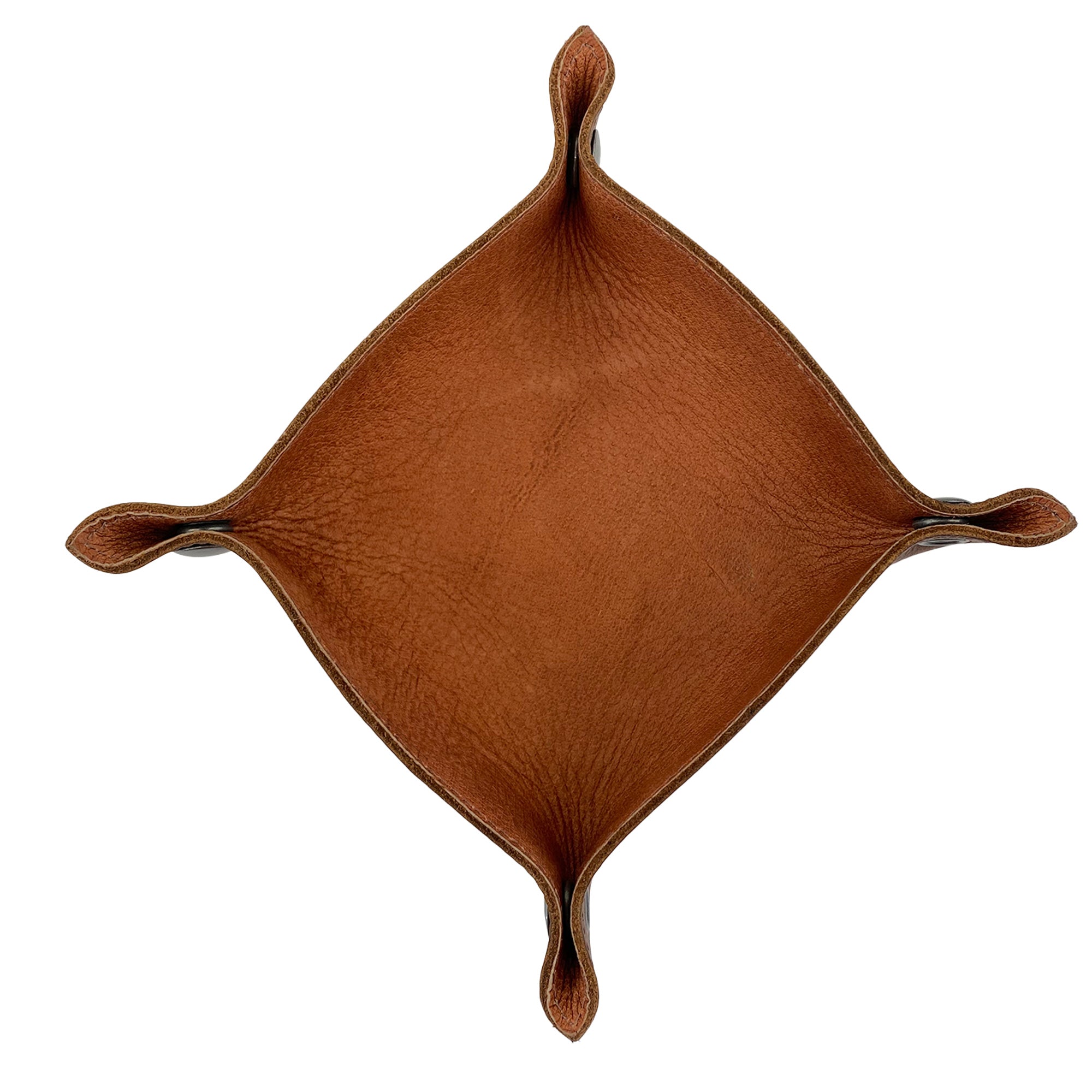 A top view of the Squared Catchall by Leather At Home reveals its unique design and craftsmanship. This handmade tray is perfect for organizing essentials, showcasing quality materials and artisanal skills from La Antigua Guatemala and Oaxaca Mexico.