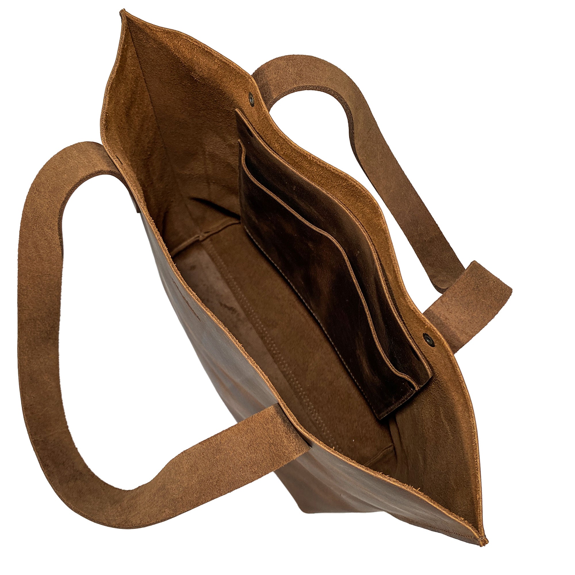 Interior view of Heather's Minimalist Shoulder Bag, revealing a well-organized space for everyday essentials. This Minimalist Handbag Vintage Purse with Handle is crafted from Full Grain Leather, designed for durability and style, handmade in Antigua Guatemala.