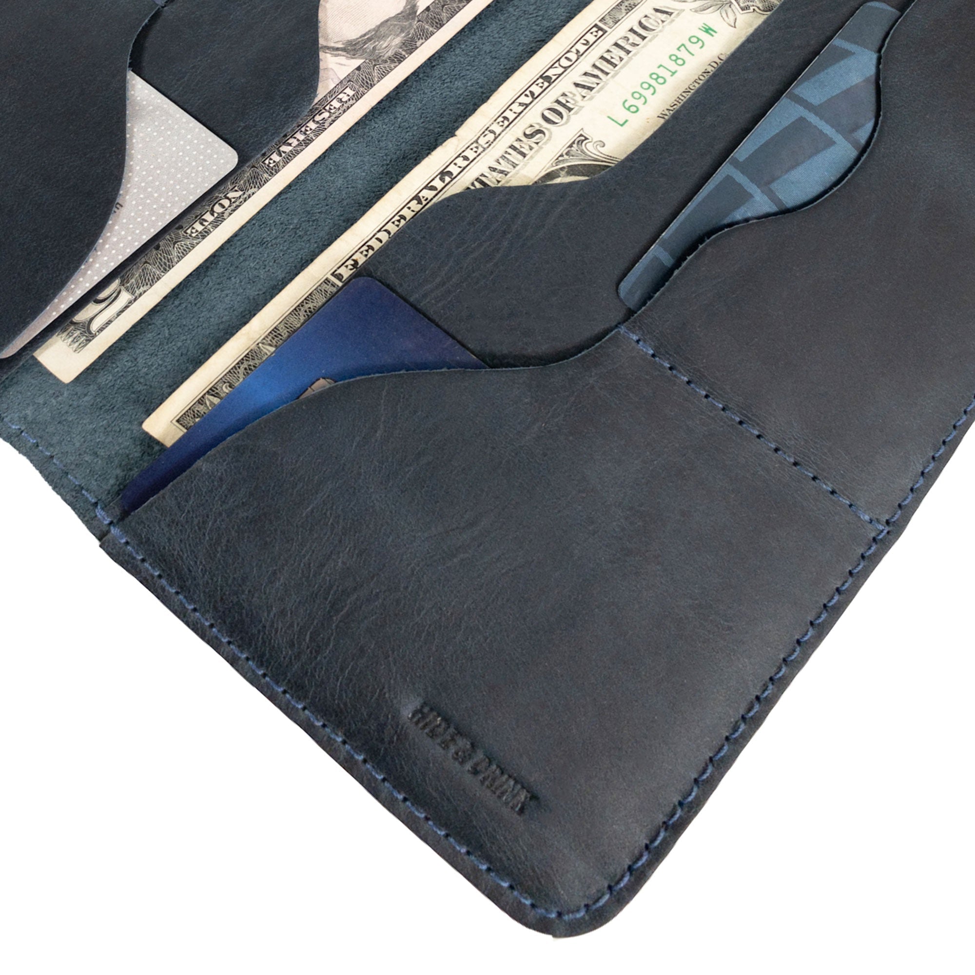 Hide & Drink Large Organizer Wallet displayed open to show card slots and cash holders. This artisan-crafted bifold wallet is made from quality full grain leather, serving as a stylish night bag and travel accessory, handmade in La Antigua Guatemala & Oaxaca Mexico.