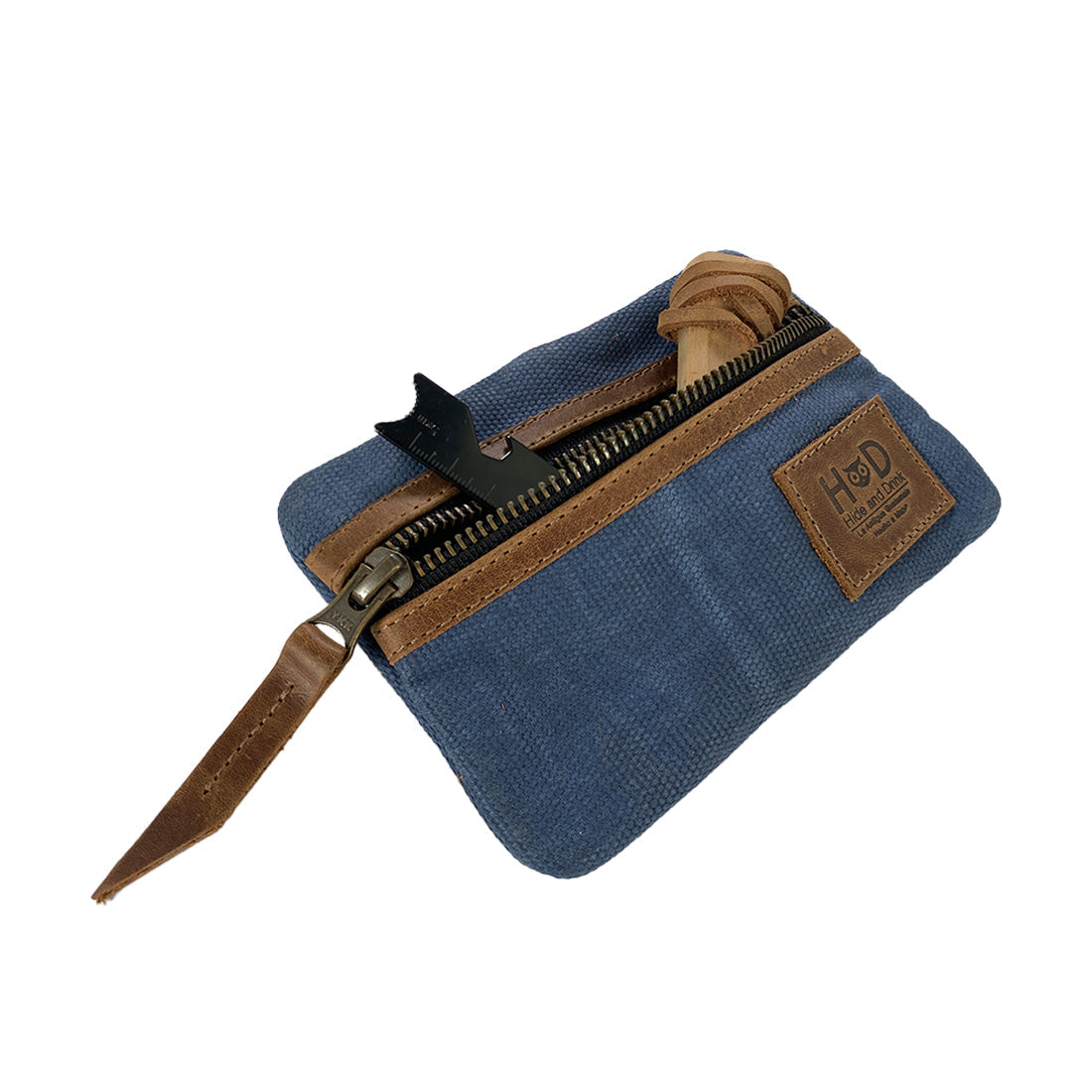 Open Multi-tool Pocket Pouch in blue by Hide & Drink, displaying its organized compartments for everyday carry essentials, perfect for outdoor adventures.