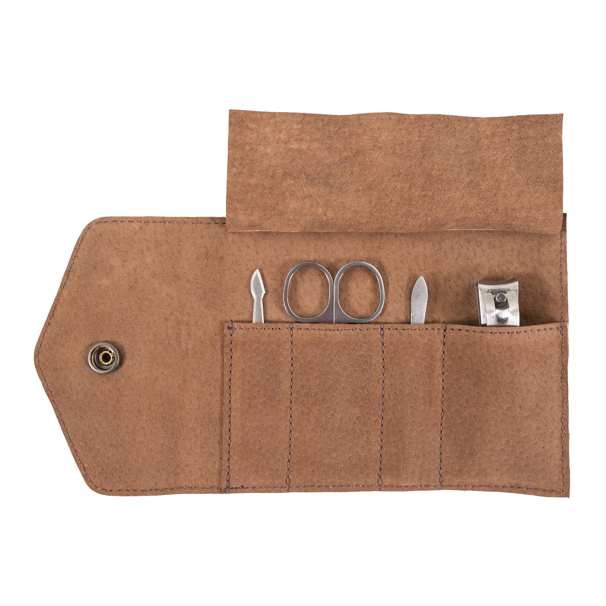 Inside layout of the Nail Clipper Roll Case by The Stockyard Exchange, designed to hold grooming essentials. This Full Grain Leather case, ideal as a Nail Clipper Set Case, reflects high-quality craftsmanship. Artisan-made in La Antigua Guatemala, featuring hand-cut, hand-sewn production and a rustic, functional style.
