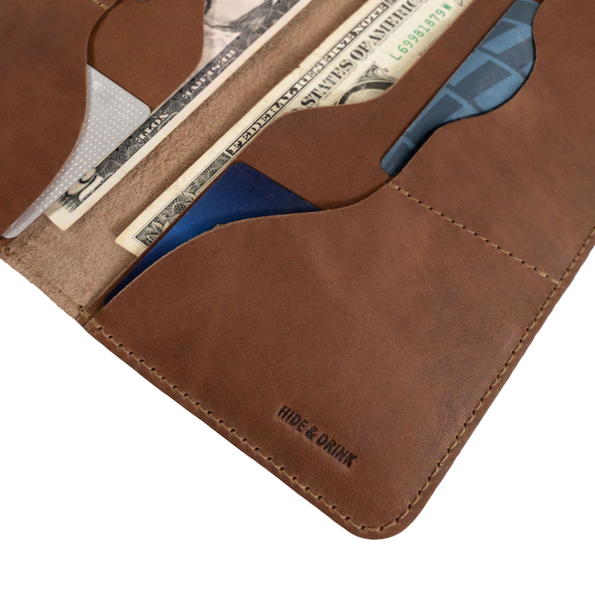 Hide & Drink Large Organizer Wallet showing the stylish design and quality stitching. This bifold wallet with card slots serves as a flat money holder, made from full grain leather, highlighting the small batch artisan production in La Antigua Guatemala & Oaxaca Mexico.