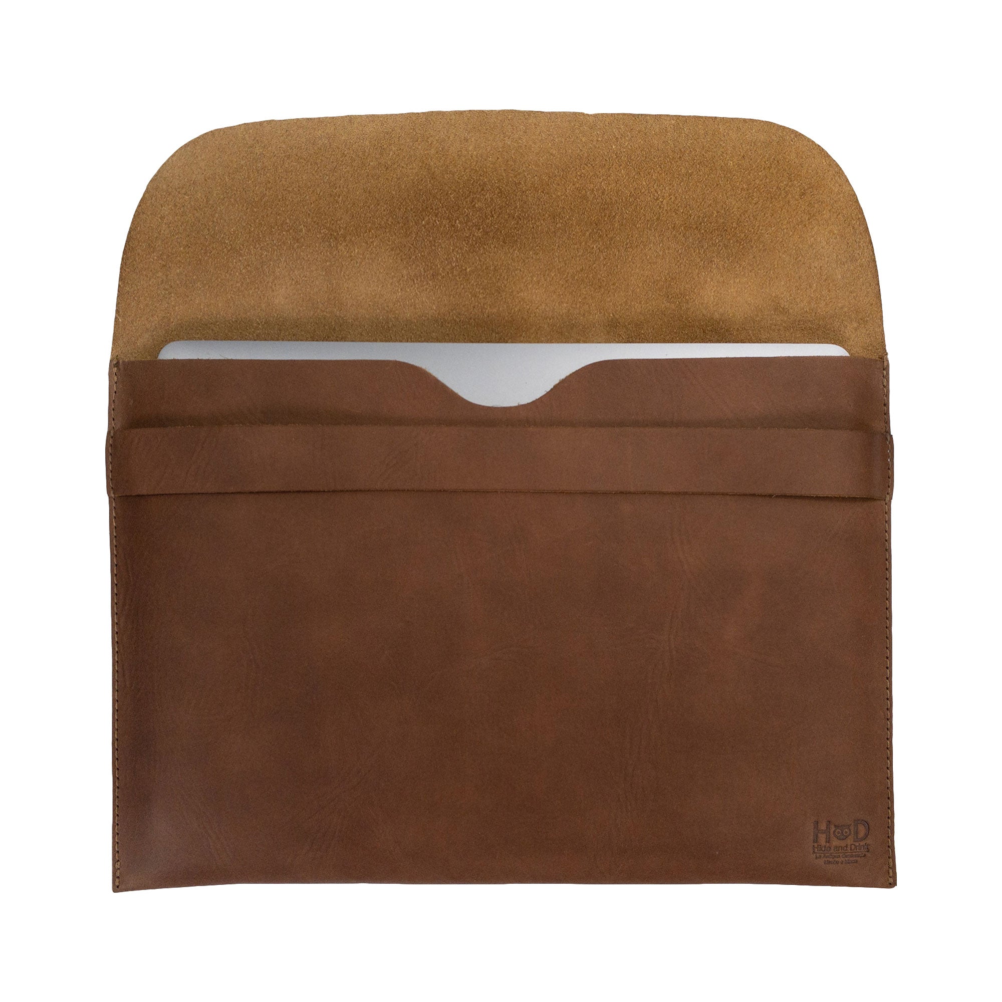 Smooth back view of the brown Hide & Drink MacBook Slim Case, revealing its clean lines and craftsmanship. This case fits MacBook Air/Pro 13 Inch with M1 Chip, emphasizing the artisan quality derived from small batch production and full grain leather.