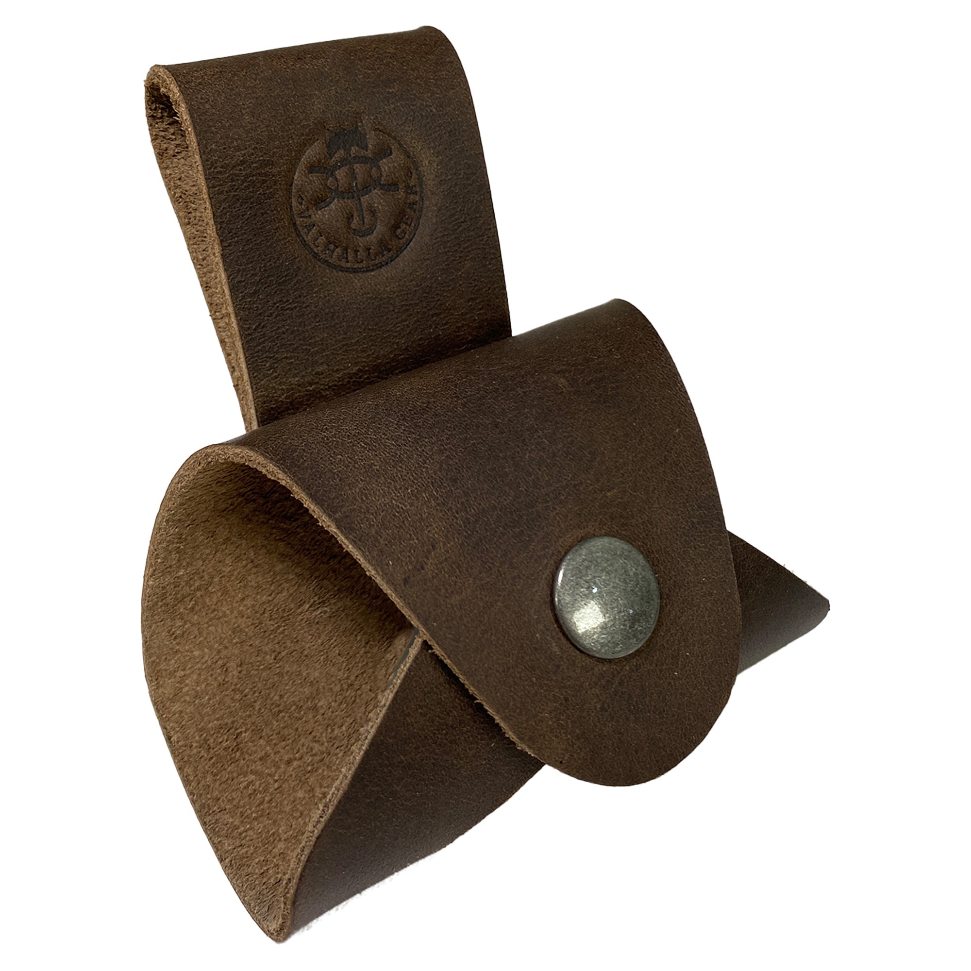Axe Holster by Valhalla Gear, tailored for secure axe storage and transport. This Axe Holster for Belt - Protector Case functions as a small axe blade safety sleeve, ideal for outdoor adventures and camping. Crafted from resilient full grain leather, it embodies lumberjack outdoor essentials with a focus on quality achieved through small batch production, hand cut, and hand sewn techniques. Fire branded for authenticity, this artisan product is handmade in La Antigua Guatemala & Oaxaca Mexico.