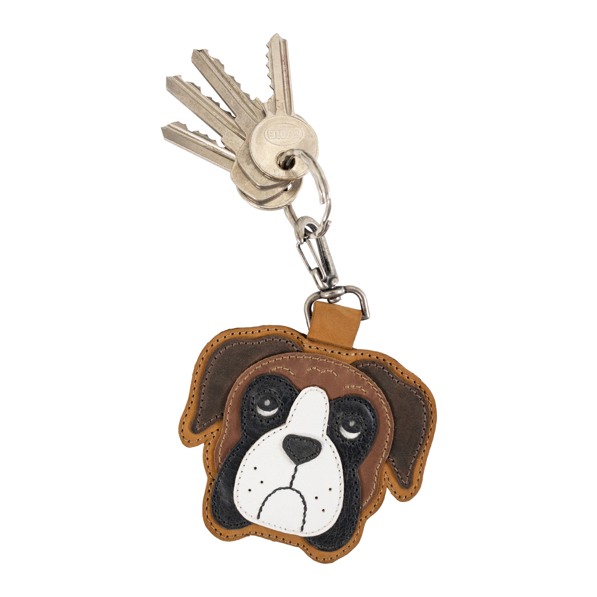 Boxer Face Charm by TACO DOG attached to a set of keys, made from high-quality Full Grain Leather. This artisan charm reflects dedication to small batch production, hand cut and hand sewn techniques, ensuring a unique touch. Handmade in La Antigua Guatemala & Oaxaca Mexico, perfect for gifts.