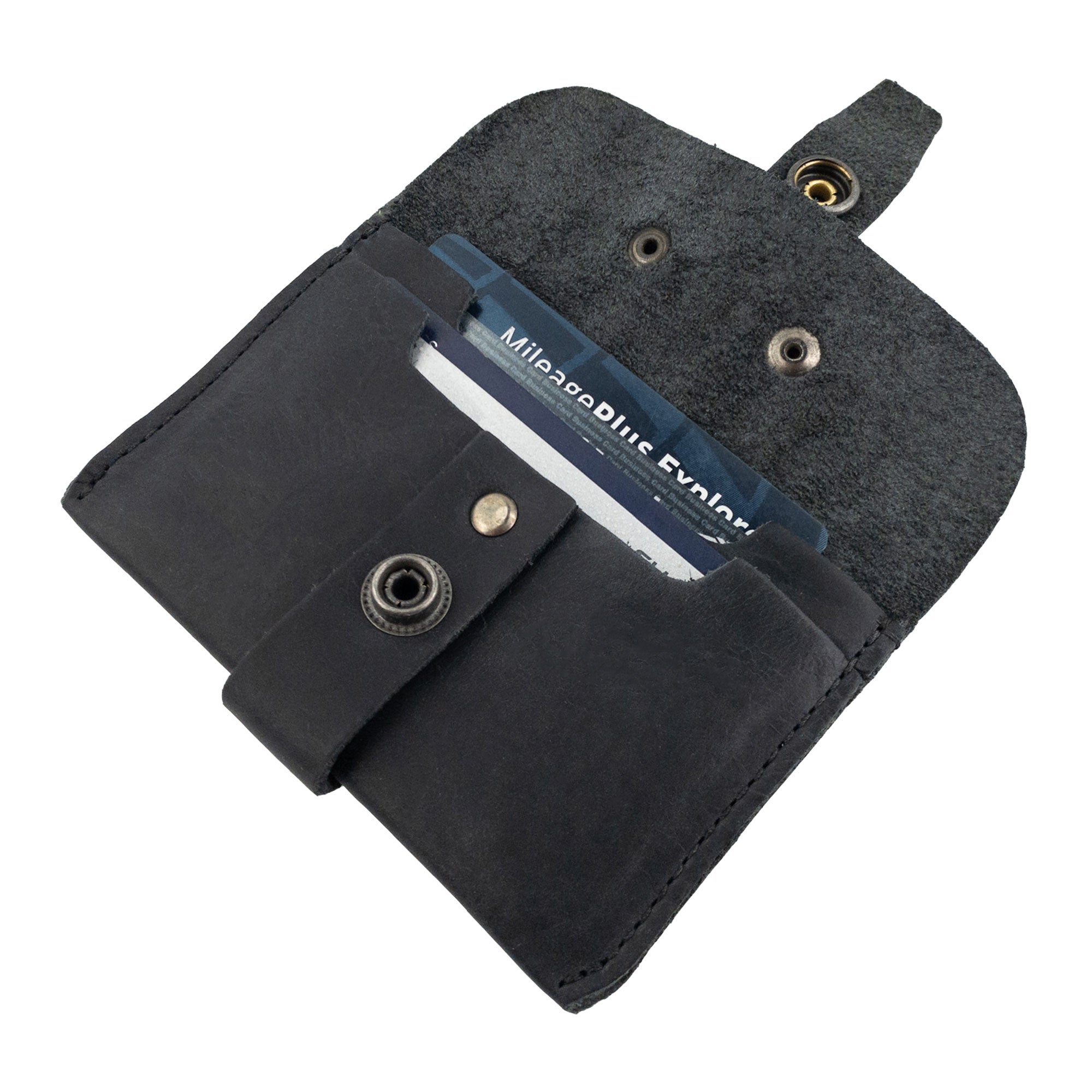 Another look at the interior of Hide & Drink's black Credit Card Holder, complete with card slots. This minimalist front pocket wallet is crafted from Full Grain Leather and is a perfect everyday carry for those valuing artisan quality.