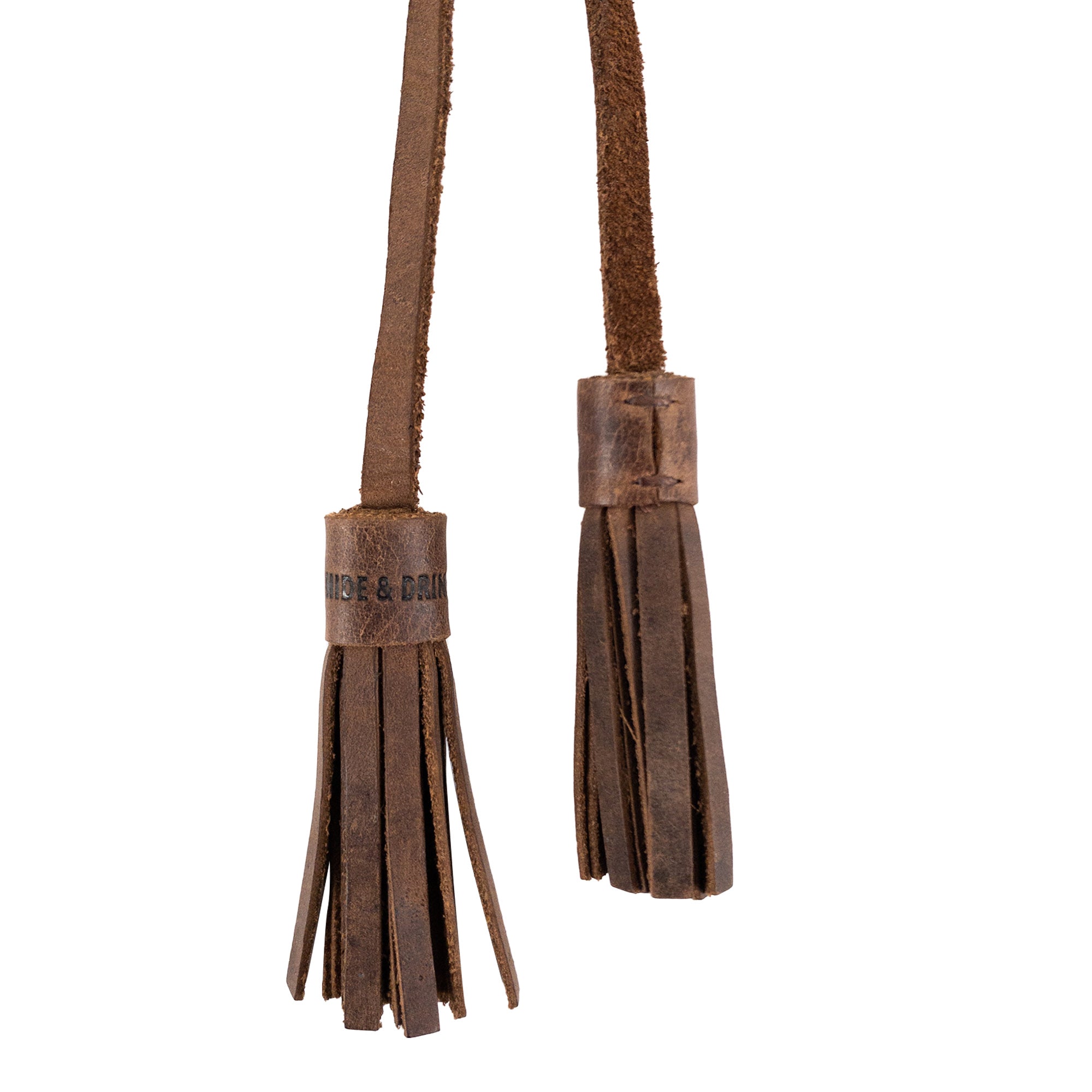 Close-up view of Hide & Drink Bag Accessory / Tassels, featuring luxurious full grain leather and finely stitched details. This tasteful tassel accessory is both functional and stylish. Labrador Ornament (2 Pack) / Hanging Labrador Decoration/Dog Ornament/Hanging Decoration for Purses, Handbags & Backpacks, Full Grain Leather, StockyardX, Small Batch Production, Hand Cut, Hand Sewn, Fire Branded, Artisan, Handmade in La Antigua Guatemala & Oaxaca Mexico.