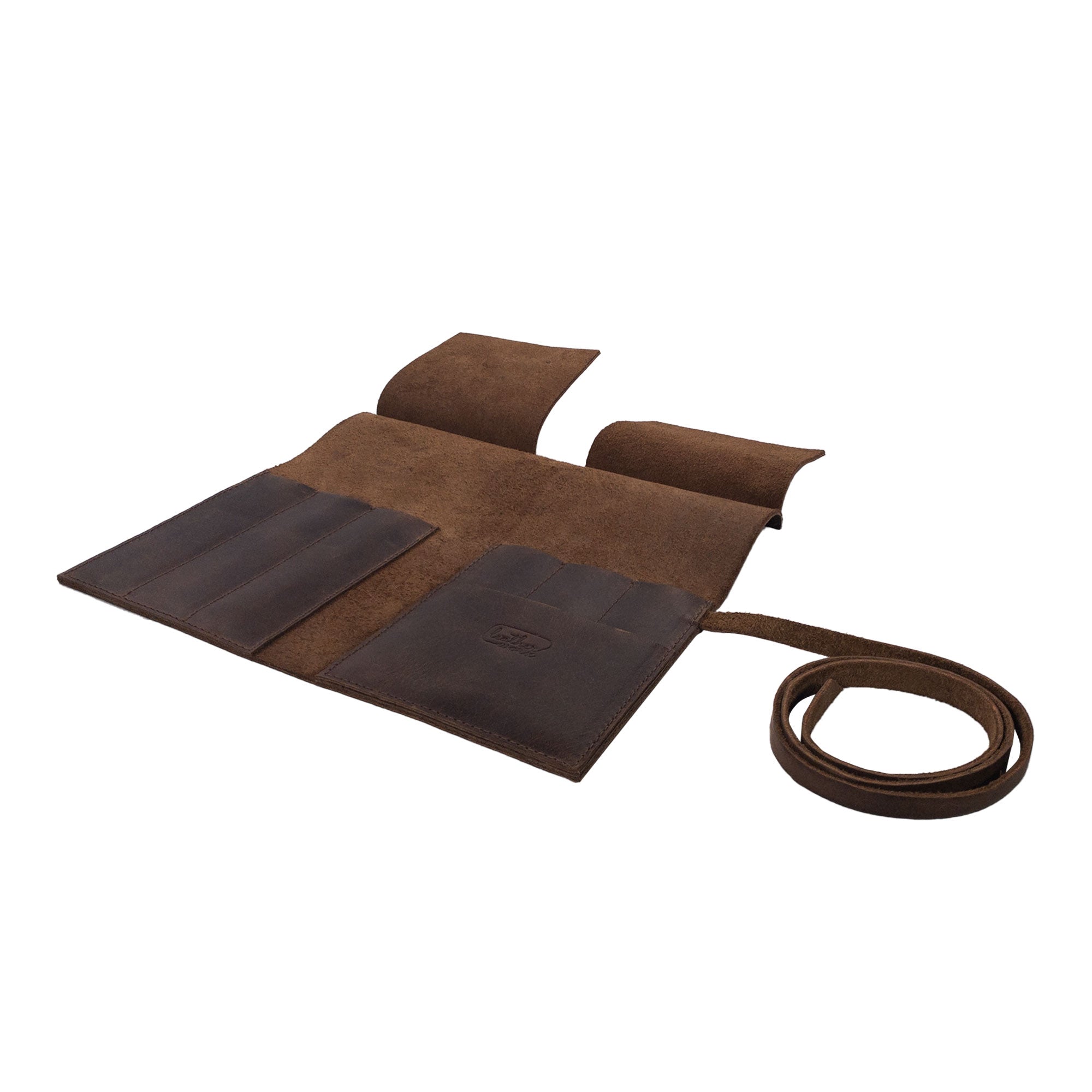 The Squared Pencil Case from Leather Worx open to display its functionality with pockets for pens, made from rich Full Grain Leather. This handcrafted pen organizer reflects attention to detail with its small batch production, hand cut, and hand sewn style, alongside fire branding. Proudly handmade in La Antigua Guatemala & Oaxaca Mexico.