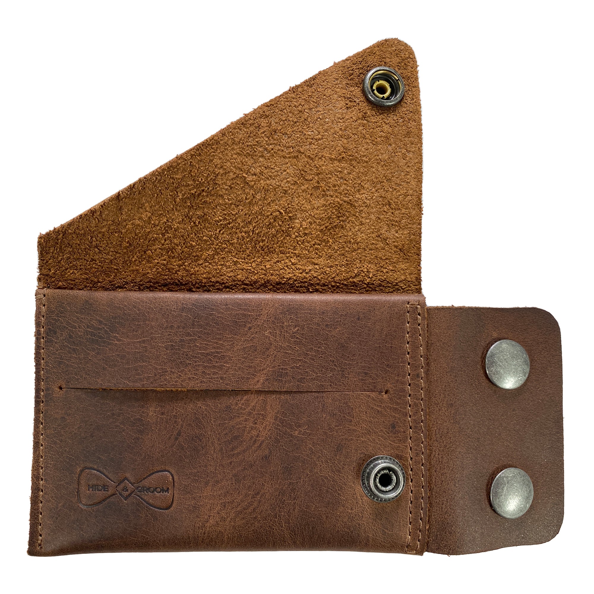 The interior of the Hide & Groom Minimalist Wallet, showcasing its thoughtful design for organizing cash and cards. Made from full grain leather, this wallet highlights the quality of handmade items from artisans in La Antigua Guatemala. Minimalist Wallet - Business Card & Money Holder, Stylish Compact Money Organizer, Full Grain Leather, StockyardX, Small Batch Production, Hand Cut, Hand Sewn, Fire Branded, Artisan, Handmade in La Antigua Guatemala & Oaxaca Mexico.