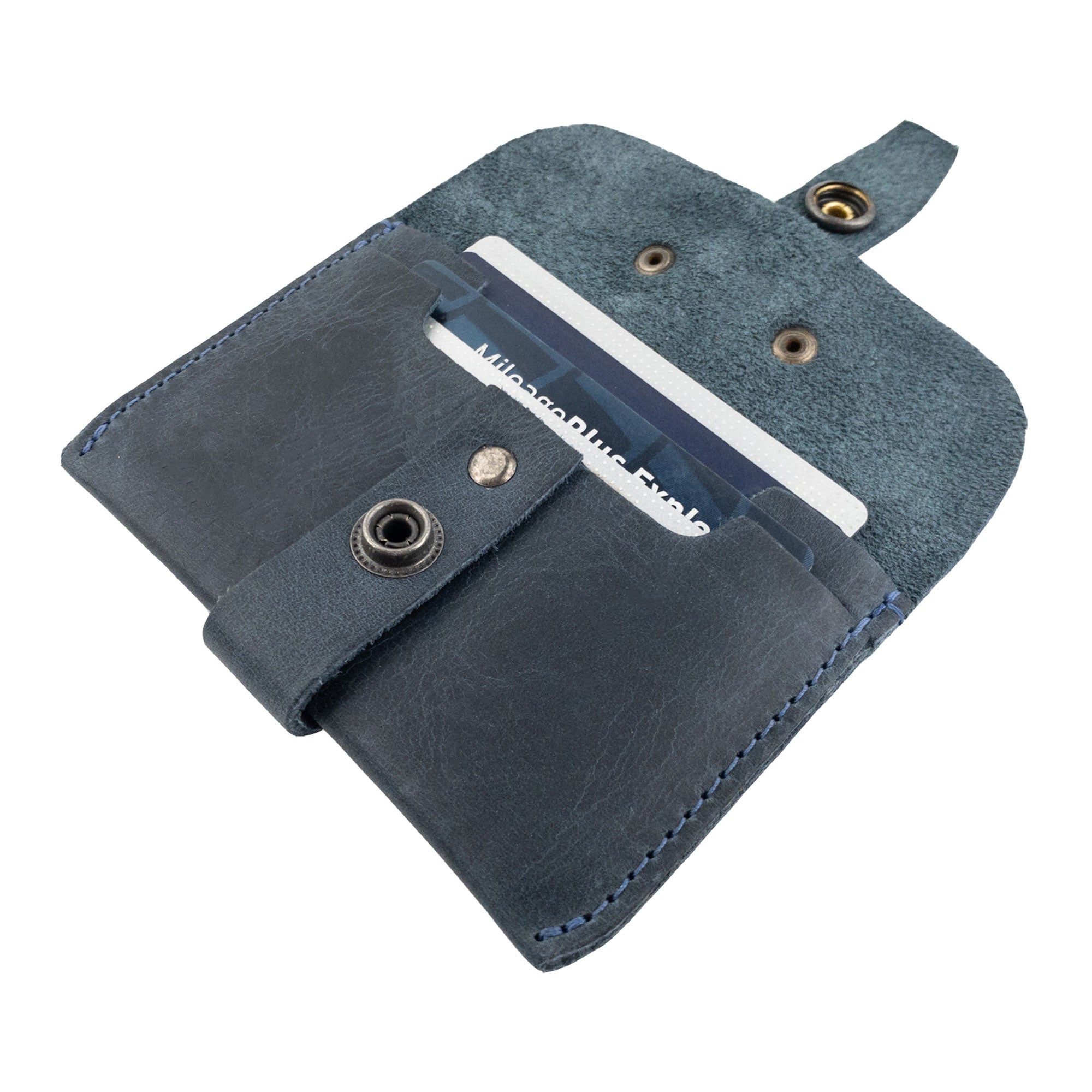 Interior view of Hide & Drink's navy Credit Card Holder, highlighting card slots. This handmade product from Full Grain Leather illustrates superior artisan craftsmanship and is ideal for those looking for a minimalist front pocket wallet.