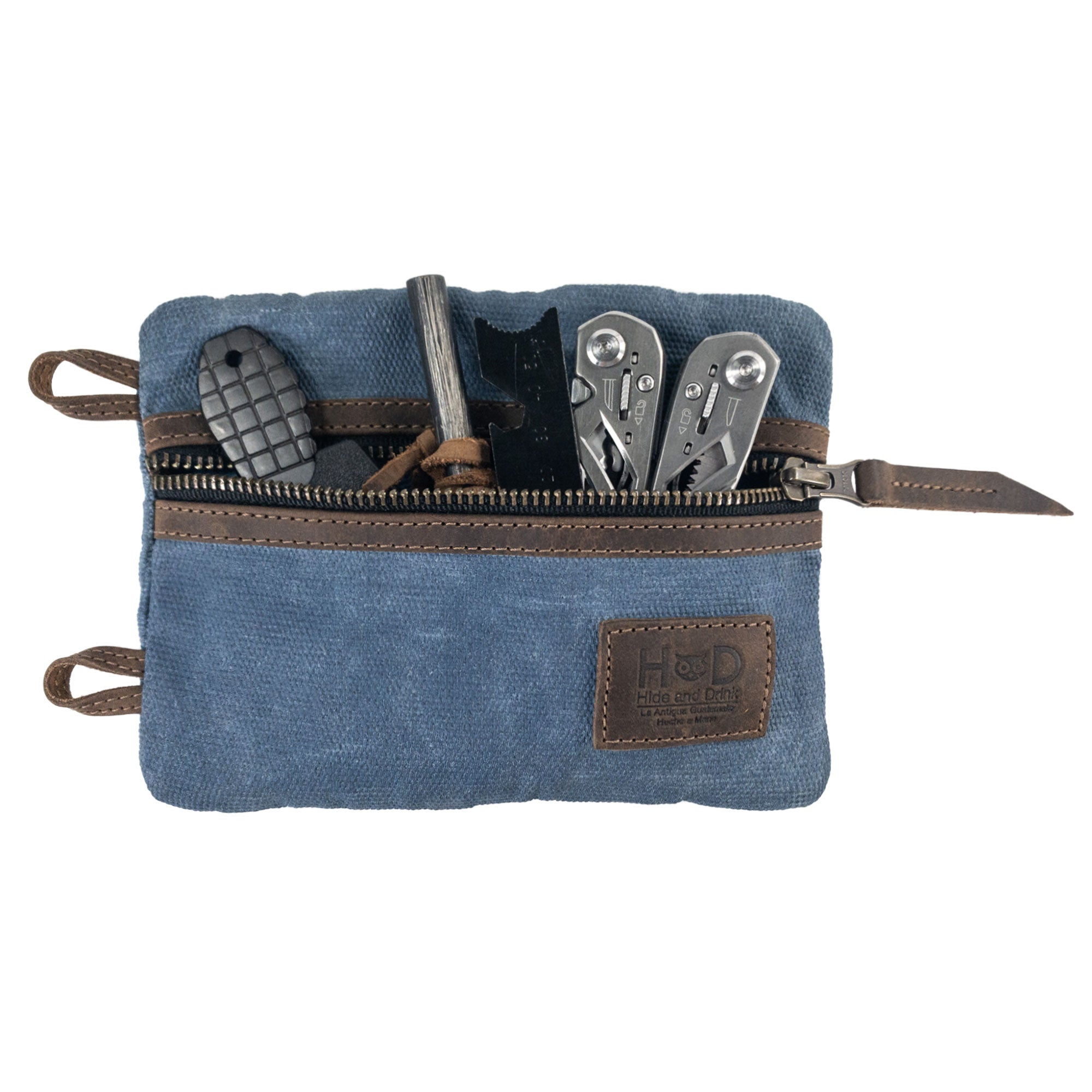 Multi-tool Pocket Pouch - XL by Hide & Drink displayed with a business card, perfectly blending style and functionality as an ideal gift. Multi-Tool Pocket Pouch XL, Compact Multipurpose EDC Zippered Bag, Knife Holster, Handmade Slim Organizer, Waxed Canvas, StockyardX, Small Batch Production, Artisan, Handmade in La Antigua Guatemala & Oaxaca Mexico.