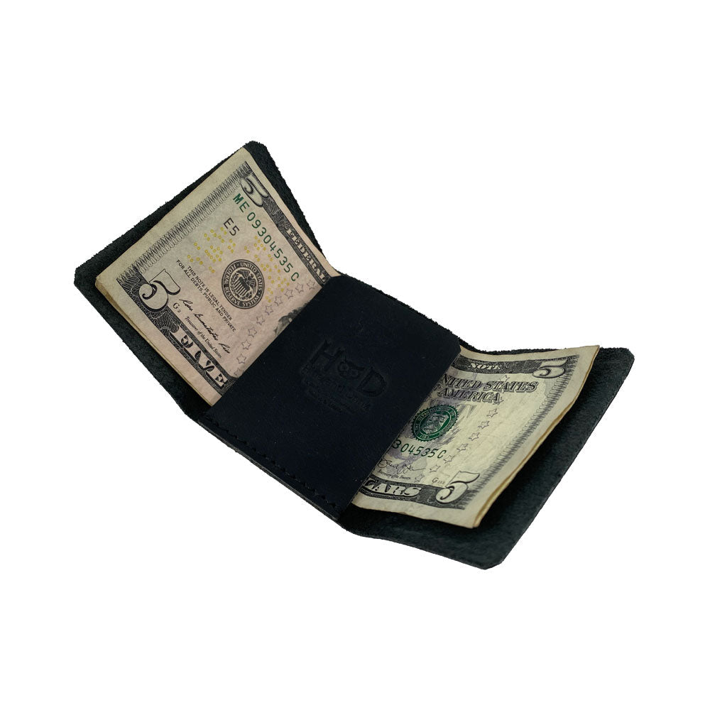 The Hide & Drink Minimalist Wallet Bills Only appearing sleek and stylish, emphasizing its minimalistic design. This Ultra Minimalist Wallet serves as a functional cash organizer, made from high-quality Full Grain Leather with hand crafted details from small batch production.