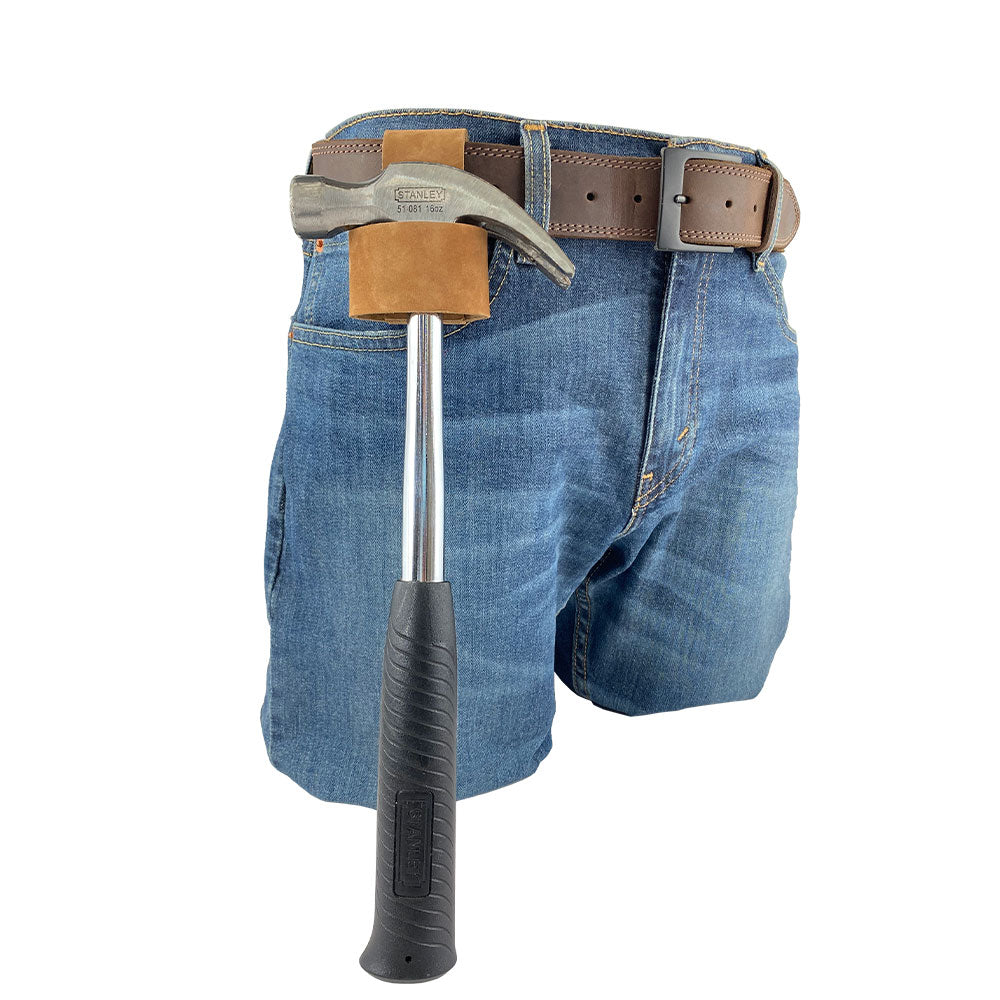 Large Hammer Holster by Hide & Drink, illustrating the balance between style and functionality appropriate for the handyman. A reliable hammer holder with belt loop crafted from rich full grain leather. Artisan-made in La Antigua Guatemala for lasting durability.