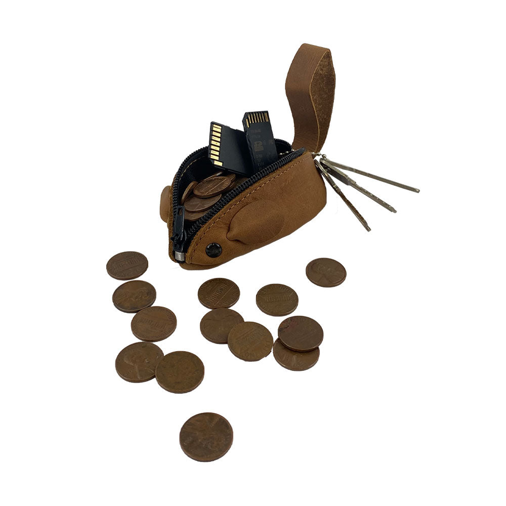 Open view of the Hide & Drink's Mouse Coin Pouch with coins and SD cards inside, illustrating its capacity. This Mouse-Shaped Coin Pouch doubles as a pocket case for coins and storage, made from premium full grain leather.