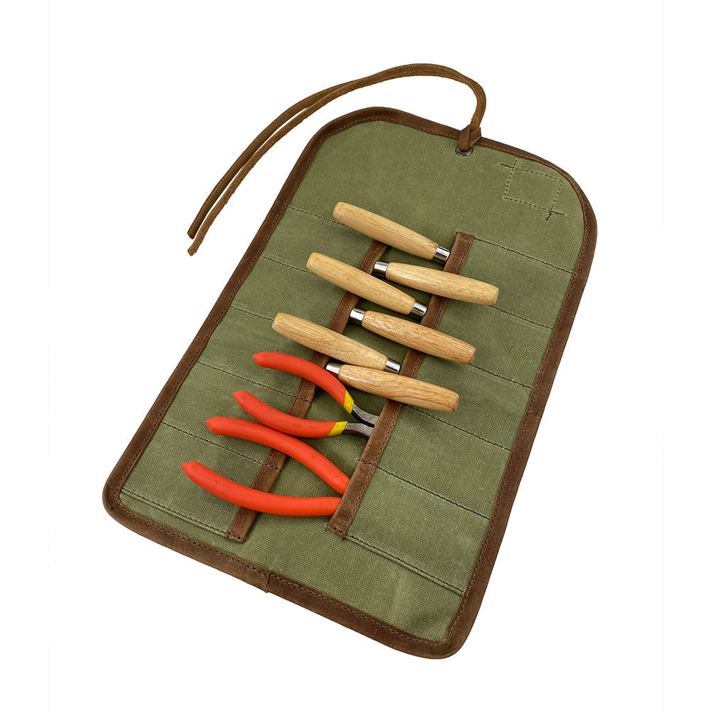 Hide & Drink Tool Roll features a durable small tool roll-up bag with 10 slots, constructed using fine full grain leather. Ideal as a portable carry-on pouch for woodworking tools, it boosts organizing capabilities in your workshop storage. Handcrafted with care in La Antigua Guatemala & Oaxaca Mexico, highlighting artisan skill.
