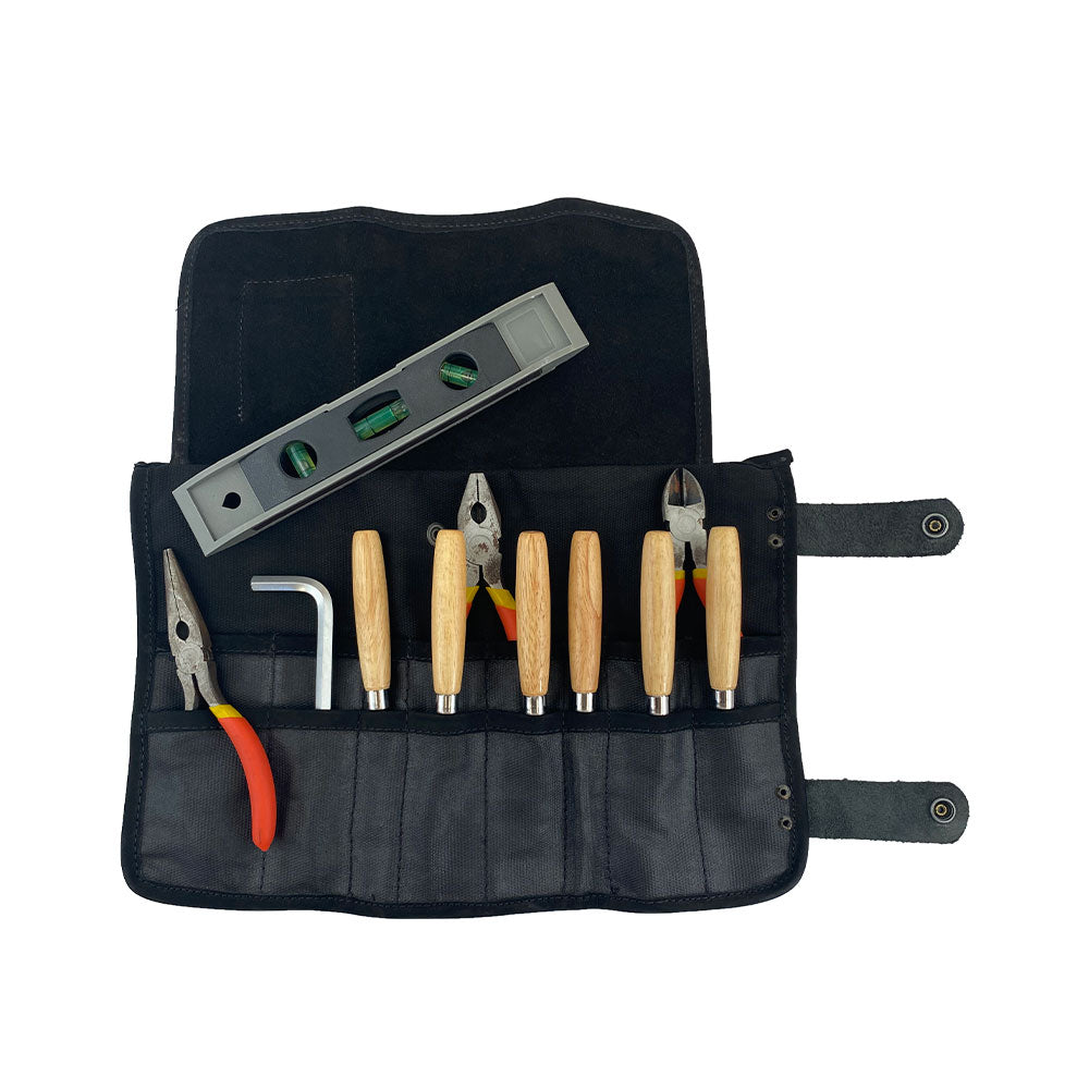 Hide & Drink showcases its Barber Tool Roll, featuring a Snap Tool Roll Up Bag with 14 Slots for scissors & screwdrivers. Made from Full Grain Leather, this portable carry case embodies StockyardX's dedication to artisan craftsmanship and small batch production, hand cut, hand sewn, and fire branded in La Antigua Guatemala & Oaxaca Mexico.