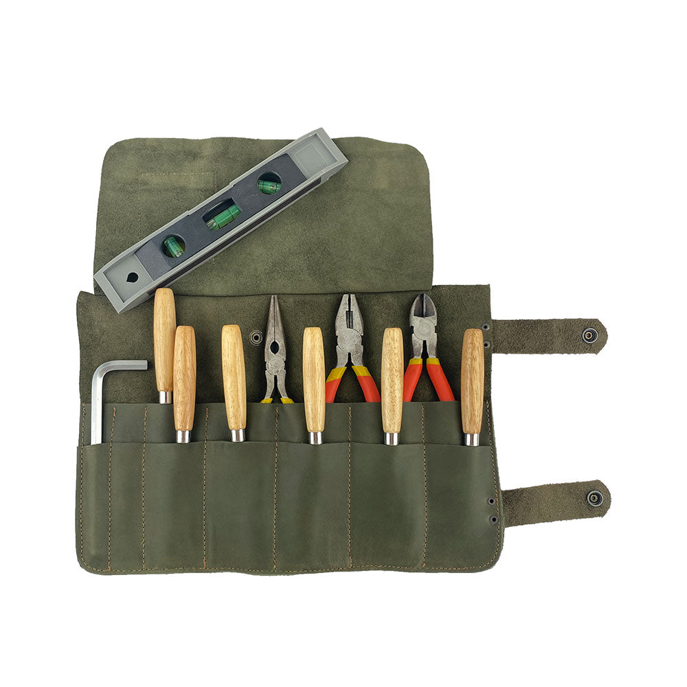 Hide & Drink presents its Barber Tool Roll, featuring a Snap Tool Roll Up Bag with 14 Slots suitable for scissors & screwdrivers. Constructed from durable Full Grain Leather, this portable carry case reflects StockyardX's dedication to small batch production and artisan craftsmanship, hand cut, hand sewn, and fire branded in La Antigua Guatemala & Oaxaca Mexico.