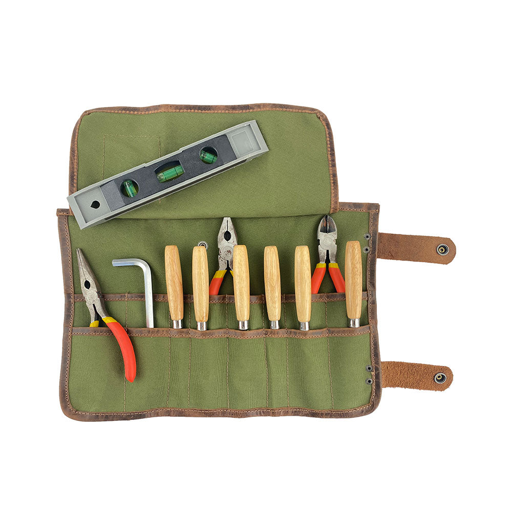 Hide & Drink's Barber Tool Roll opens to display a Snap Tool Roll Up Bag with 14 Slots, perfect for organization of scissors & screwdrivers. Made from Full Grain Leather, this portable carry case showcases StockyardX's ethos of small batch production, artisan craftsmanship, hand cut, hand sewn, and fire branded in La Antigua Guatemala & Oaxaca Mexico.