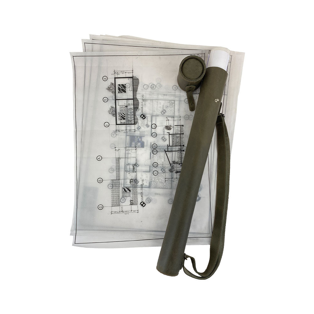 Side view of Hide & Drink's Blueprint Tube (A2 Paper Size) in navy, showcasing its stylish design. This document storage tube is made from full grain leather and includes an adjustable strap, reflecting StockyardX's commitment to artisan quality and handmade production in La Antigua Guatemala & Oaxaca Mexico.
