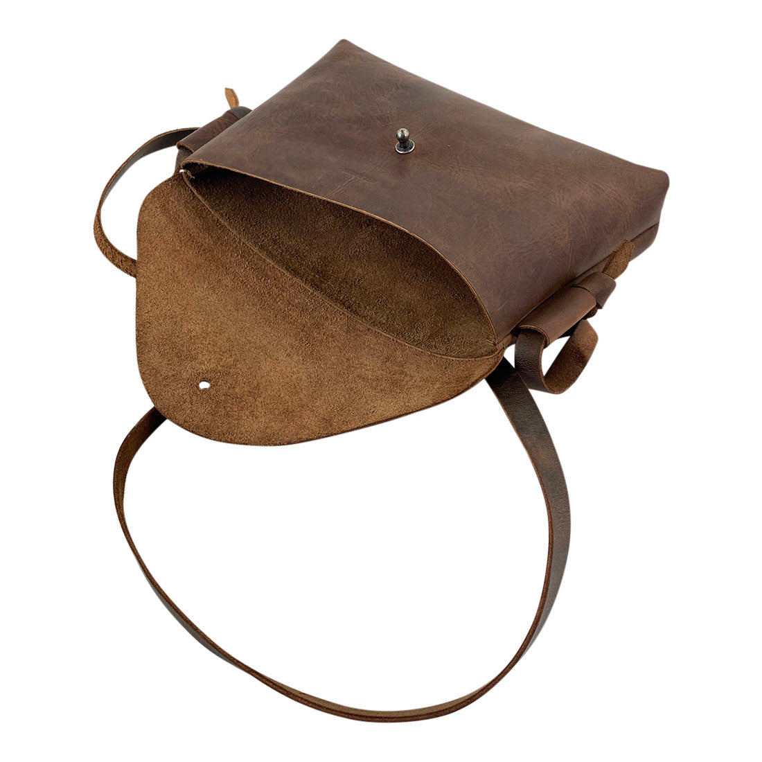 Unique Horizontal Shoulder Bag by Hide & Drink, designed with a stylish flap and secure closure. Made from premium Full Grain Leather and hand stitched, this bag illustrates the quality of small batch production by artisans in La Antigua Guatemala & Oaxaca Mexico.
