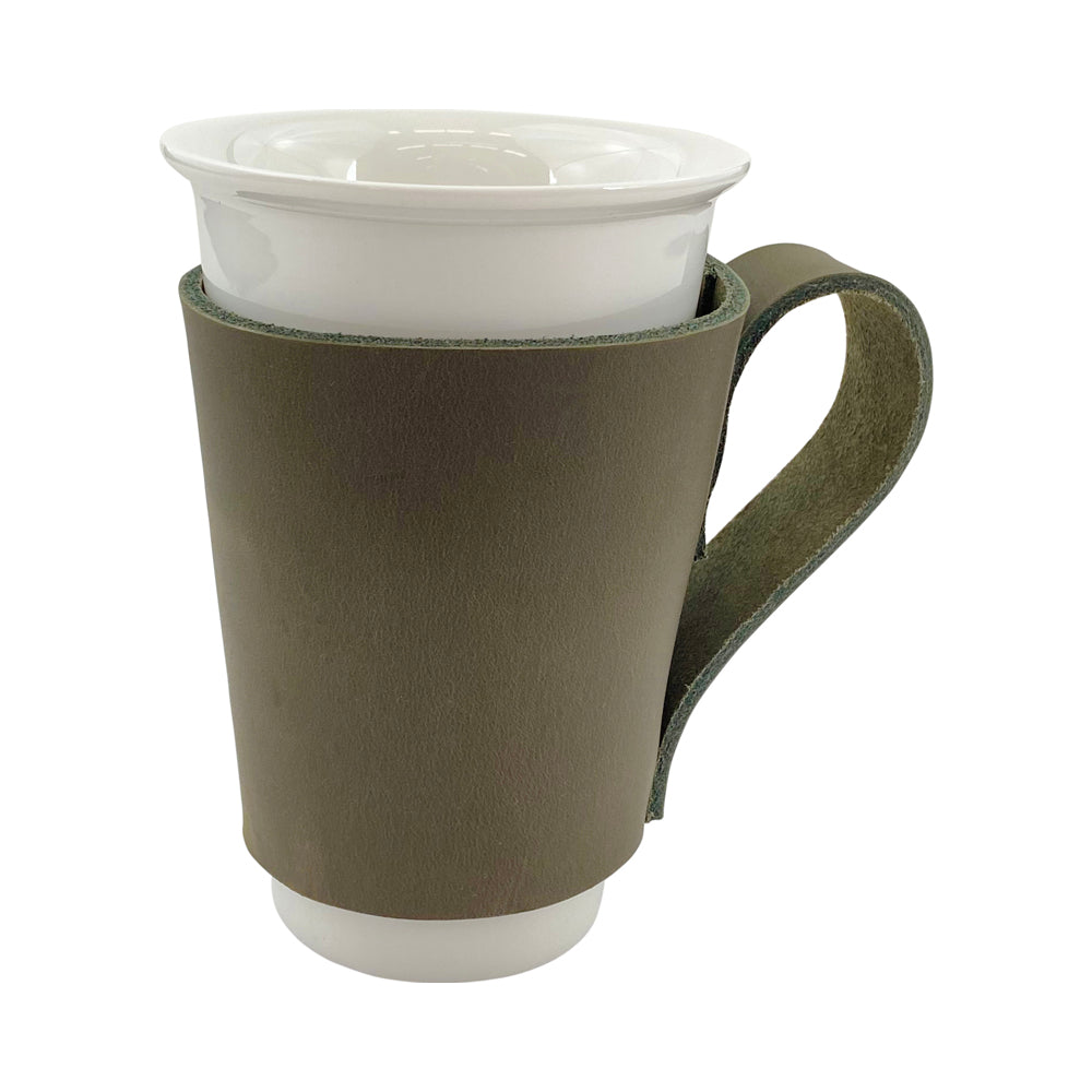 Elegant Pint Sleeve with Handle by Hide & Drink, designed to hold your favorite drink securely. This stunning item is crafted from Full Grain Leather and reflects artisan craftsmanship from La Antigua Guatemala & Oaxaca Mexico.