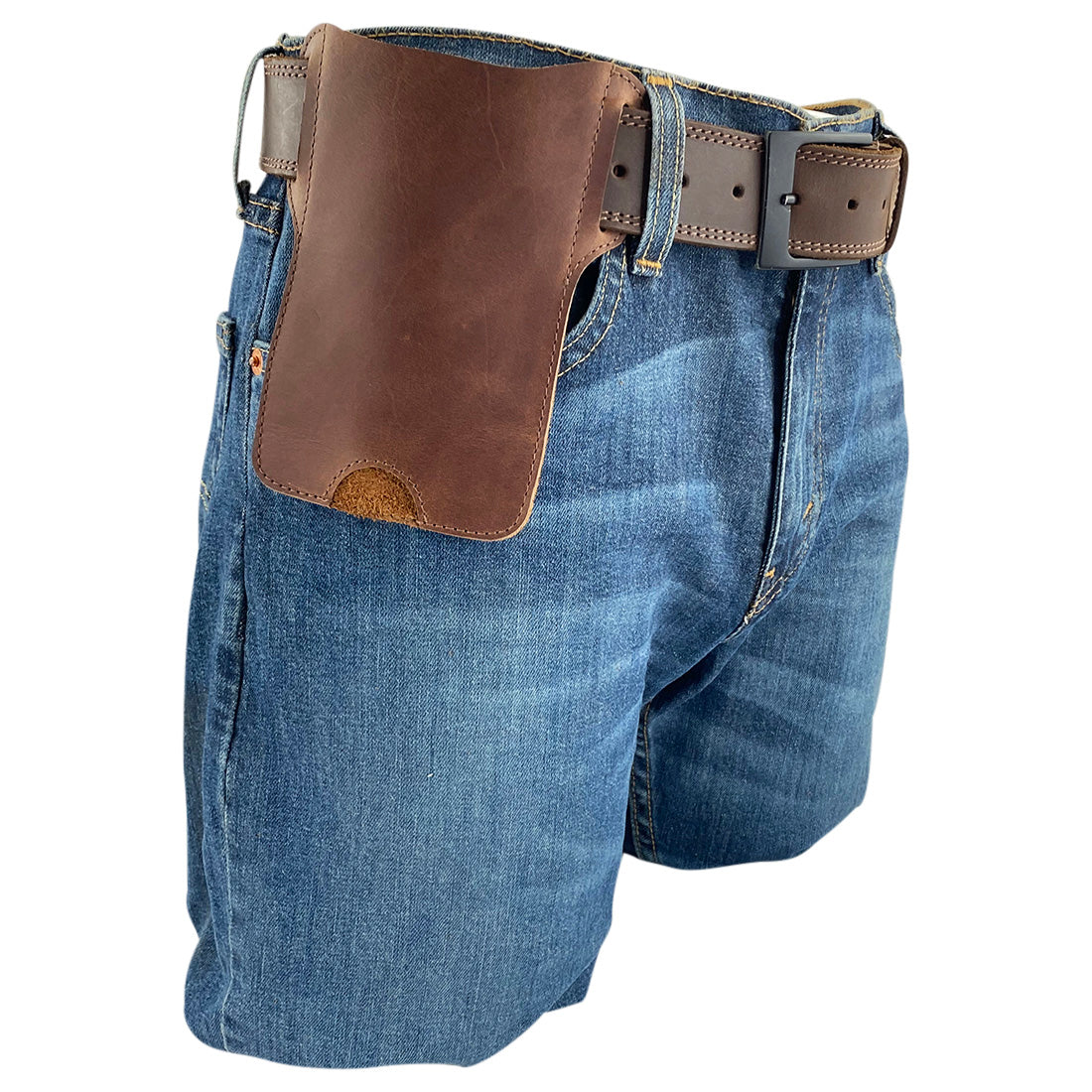 Hide & Drink Tactical iPhone 13/14 Pro Case being worn on a belt, showing its practical design. This full grain leather case is compatible with iPhone 13/14 Pro Max and highlights artisan craftsmanship from La Antigua Guatemala.
