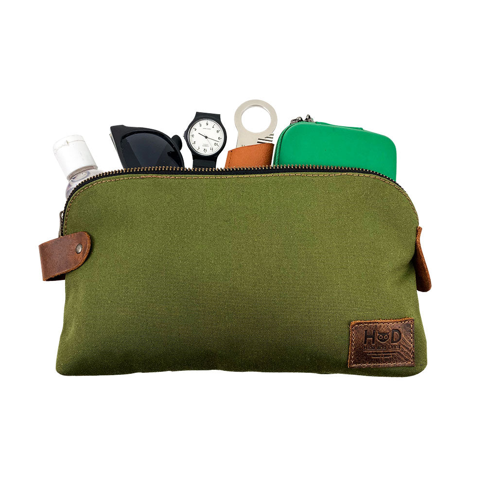 Dopp Kit Utility Bag by Hide & Drink showcasing its stylish look and multifunctional design. This large rustic all-purpose Dopp Kit Utility Bag is crafted from high-quality full grain leather, emphasizing artisanal methods including hand cut and hand sewn techniques, handmade in La Antigua Guatemala & Oaxaca Mexico.