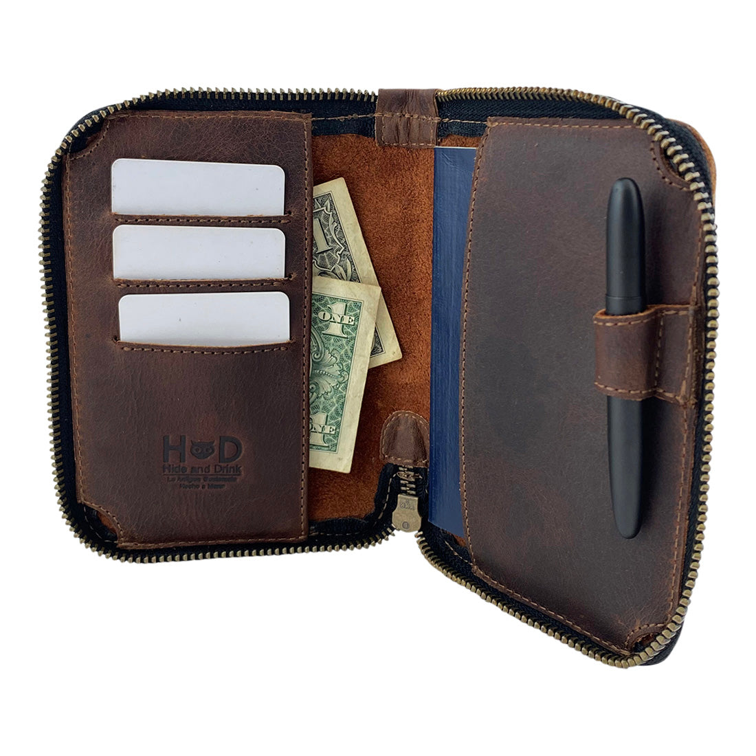 Close-up of the Zippered Passport Wallet by Hide & Drink, displaying its sophisticated compartments and quality craftsmanship in Full Grain Leather. Zippered Passport Wallet Handmade from Full Grain Leather - Storage Case for Identification, Credit Cards, Cash Full Grain Leather, StockyardX, Small Batch Production, Hand Cut, Hand Sewn, Fire Branded, Artisan, Handmade in La Antigua Guatemala & Oaxaca Mexico.