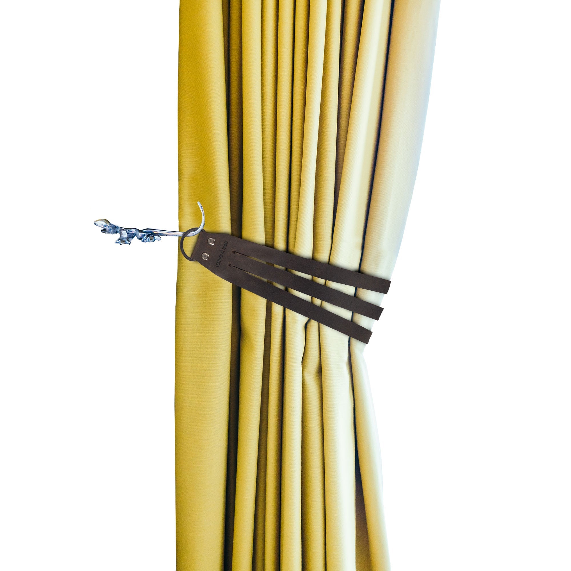 Curtain featuring the Curtain Tie Back with Half Ring (2 Pack) in use, highlighting its design and durability. Crafted from Full Grain Leather by Leather At Home, this product showcases small batch production with hand cut, hand sewn, and fire branded artistry, made in La Antigua Guatemala & Oaxaca Mexico.