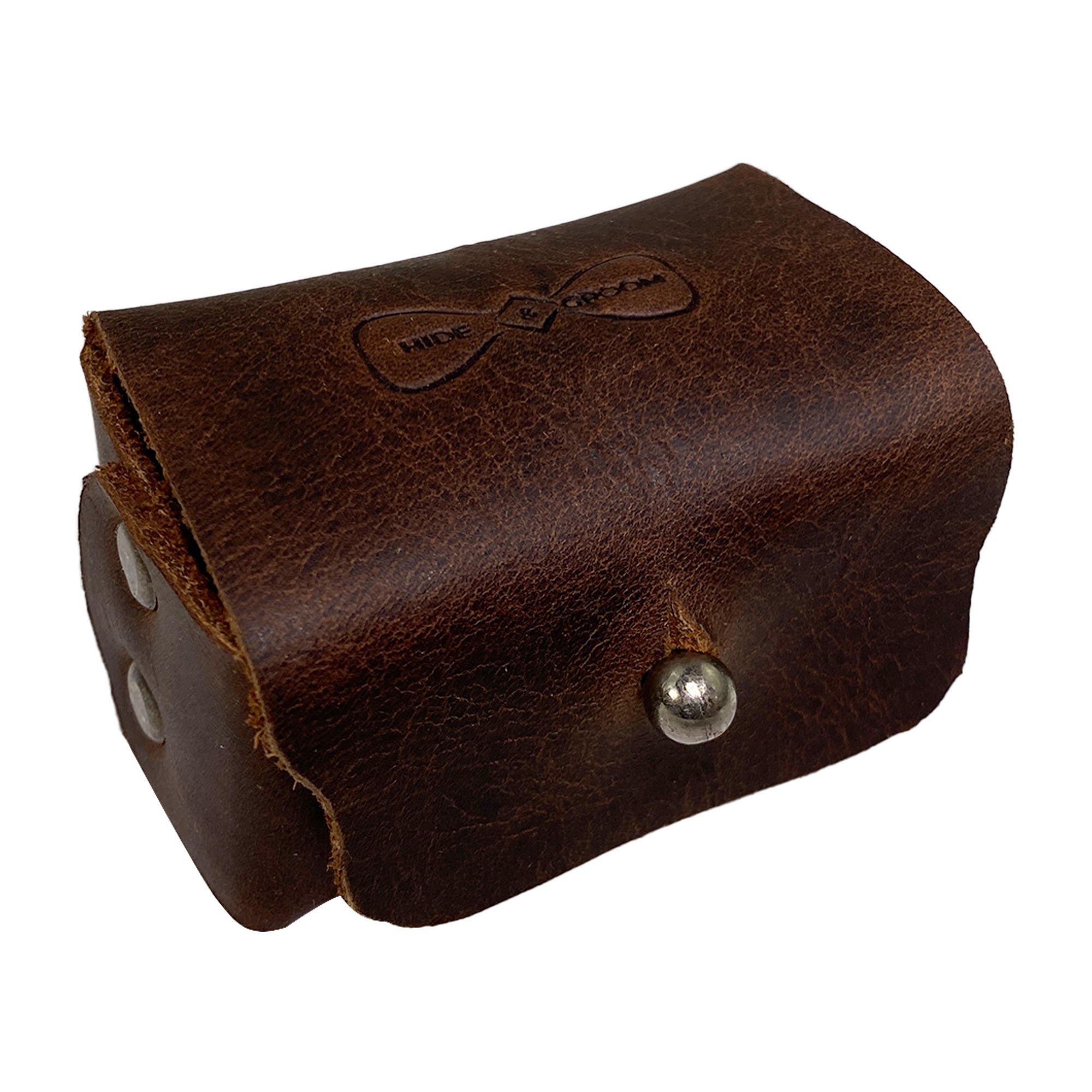 Angle view of a rustic cufflinks case by Hide & Groom, featuring the quality stitching and leather texture. Perfect for protecting men's accessories, this cufflinks case is handmade for durability and aesthetics. Rustic Cufflinks Case - Protective Storage for Shirt Studs, Men's Accessories, Full Grain Leather, StockyardX, Small Batch Production, Hand Cut, Hand Sewn, Fire Branded, Artisan, Handmade in La Antigua Guatemala & Oaxaca Mexico.