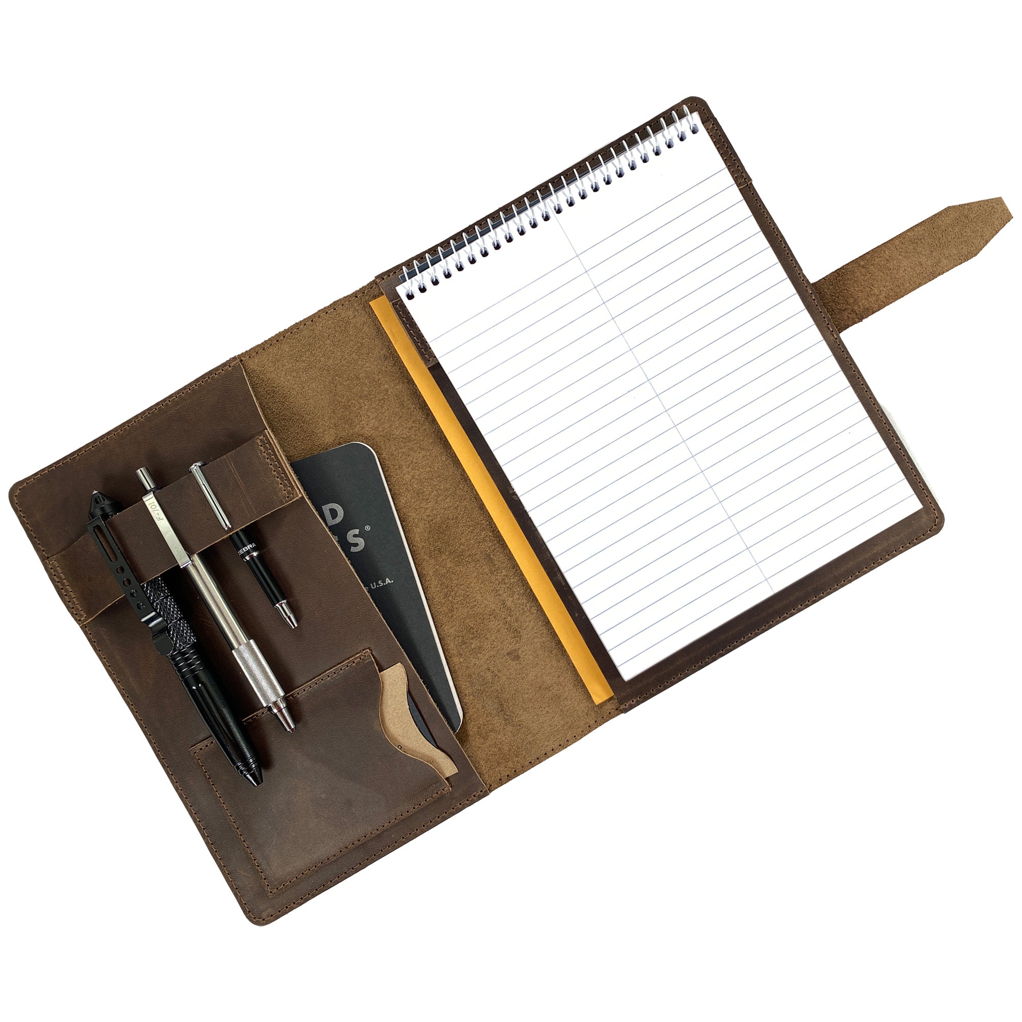 Open view of Leather Worx Notepad Cover, displaying a notepad and pen with its luxurious interior. This Notepad Cover not only provides ample space but also assures durability with its full grain leather material, crafted in a stylish and professional manner by artisans in La Antigua Guatemala.