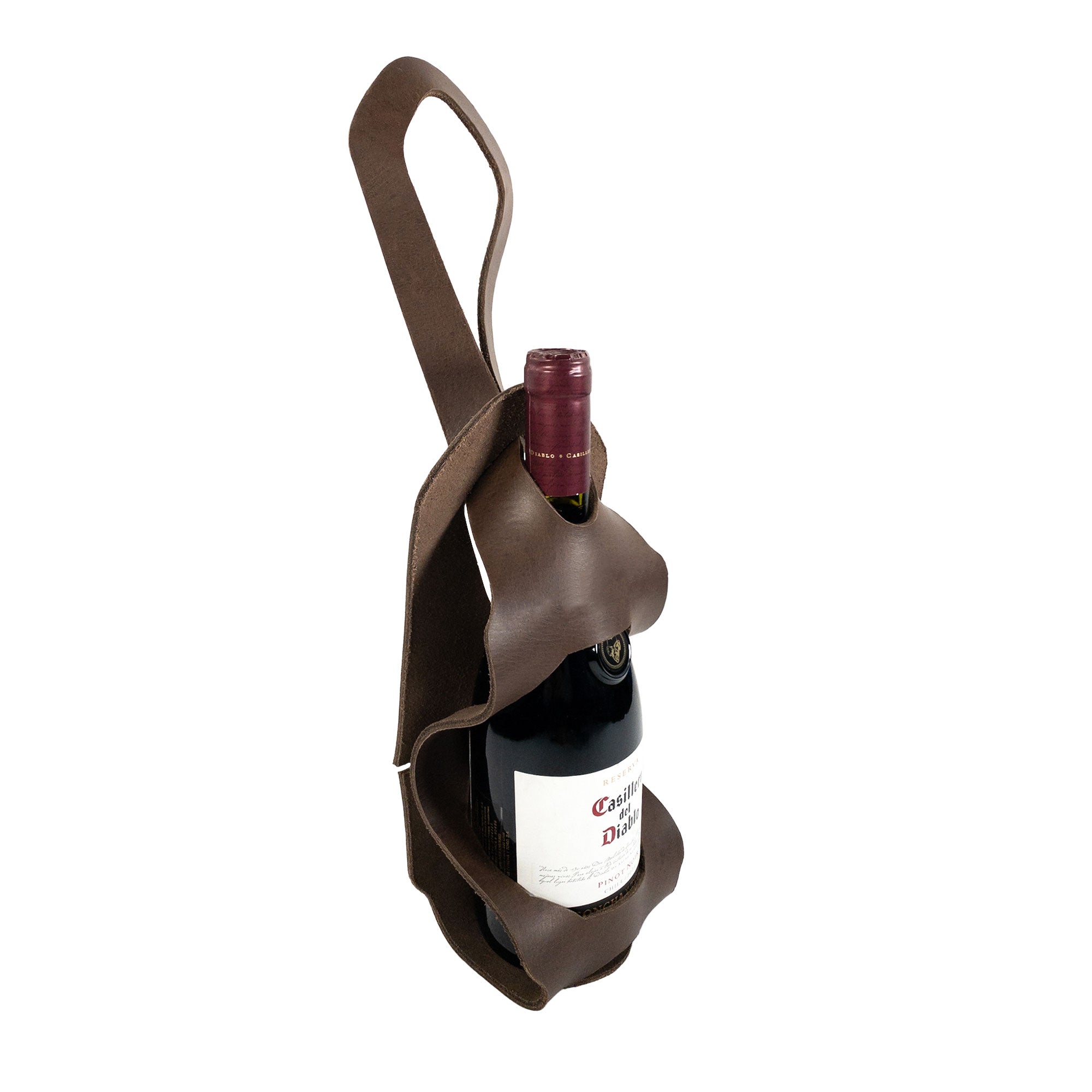 Side view of the Unibody Bike Wine Carrier from Hide & Drink, crafted from Full Grain Leather, perfect for biking. This artisan product emphasizes small batch production and exhibits the fine craftsmanship of handmade items from La Antigua Guatemala & Oaxaca Mexico.