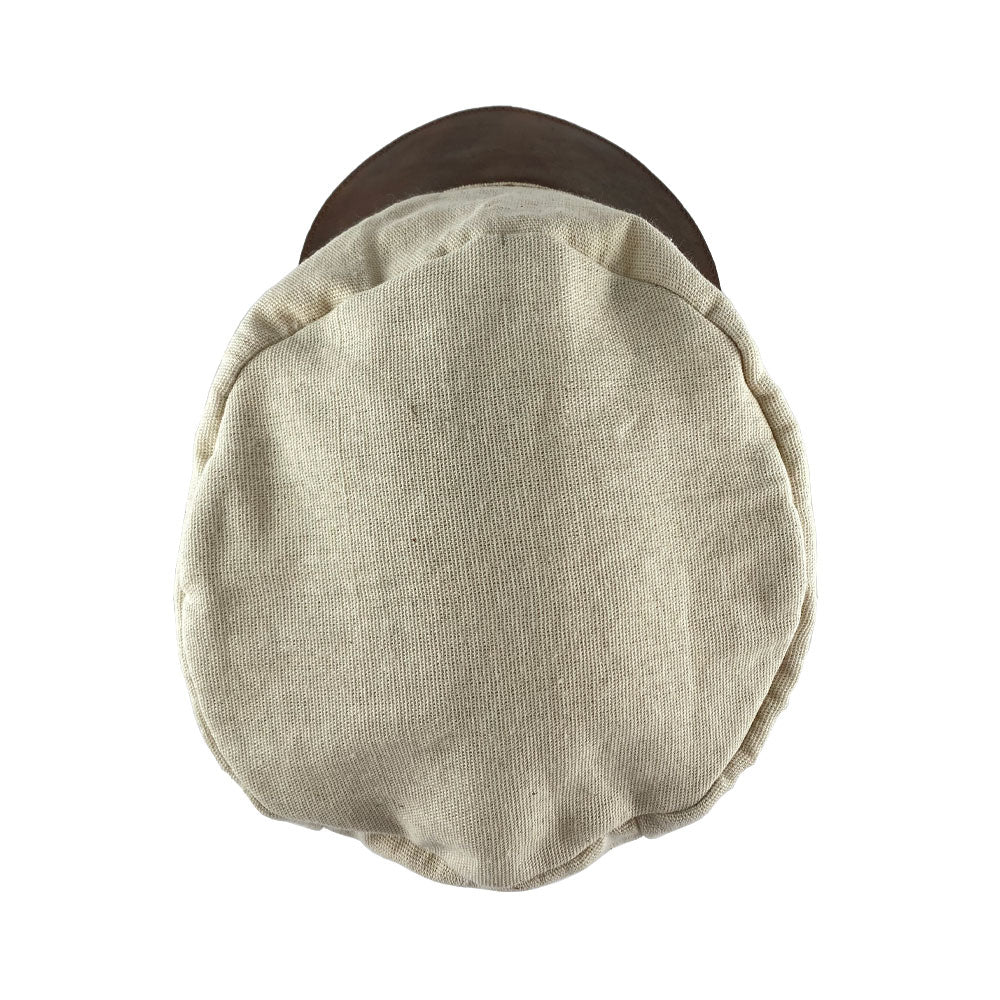 Top view of the Manta Cotton Painter Cap from Hide & Drink, showcasing the soft texture and elegant design of Full Grain Leather & Natural Manta Cotton, perfect for creative expression. This Canvas Painter Cap features small batch production, hand cut, hand sewn, and fire branded, representing artisan craftsmanship handmade in La Antigua Guatemala & Oaxaca Mexico.