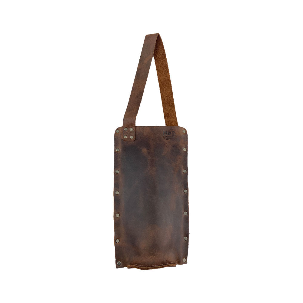 Back view of the Rustic Wine Carrier For Standard 750ml Bordeaux Bottle by Hide & Drink, showing the robust features of this Single Wine Carrier made from Full Grain Leather. Enjoy the unique touch of small batch production, artisan hand cut, hand sewn, fire branded, handmade in La Antigua Guatemala & Oaxaca Mexico.
