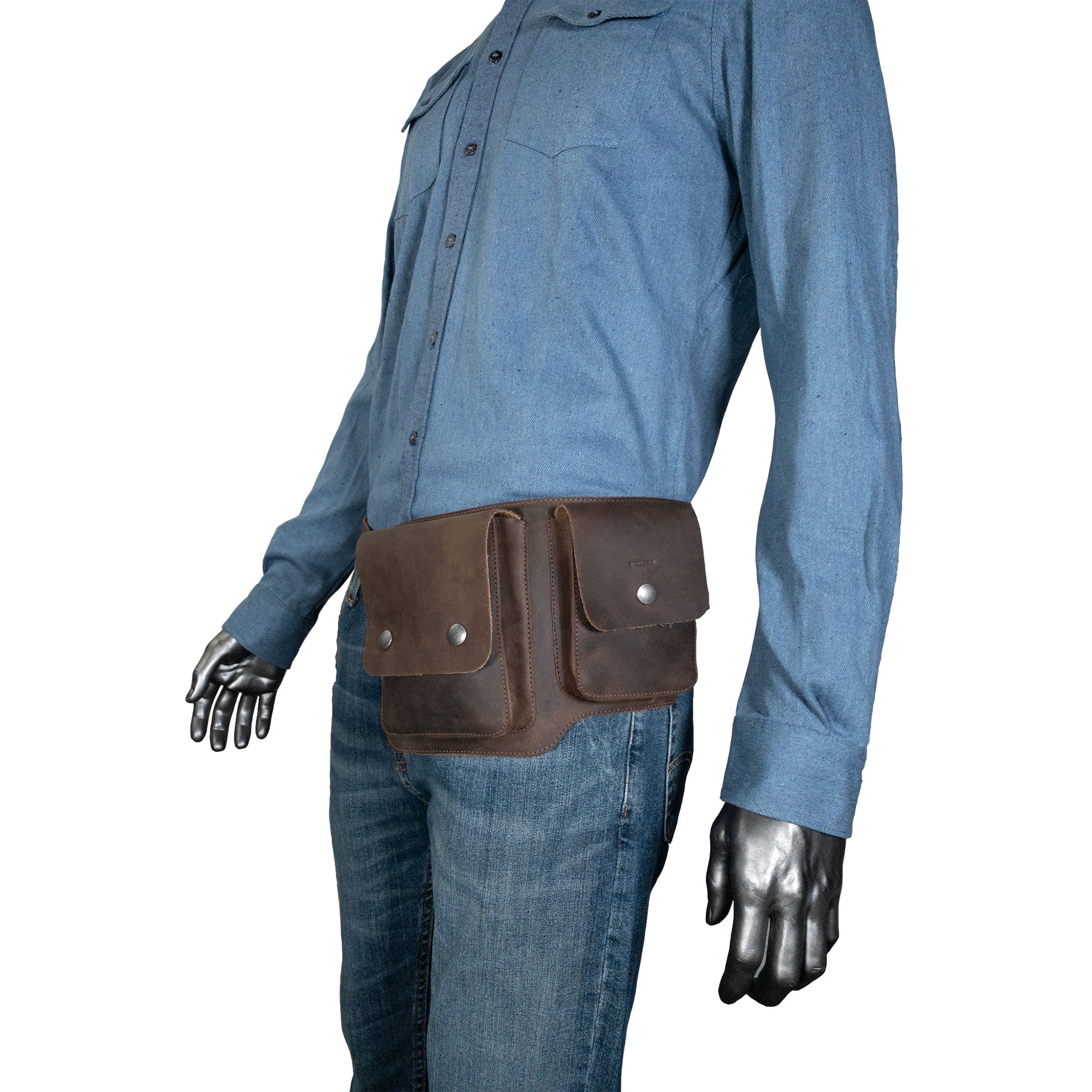 A close-up view of the Hide & Drink Rectangular Waist Bag worn by a model, highlighting its comfortable wear. This versatile Waist Bag with Adjustable Belt is made from Full Grain Leather, making it an essential outdoor accessory and tool holder for camping, with an emphasis on small batch production and artisan quality handmade in La Antigua Guatemala & Oaxaca Mexico.