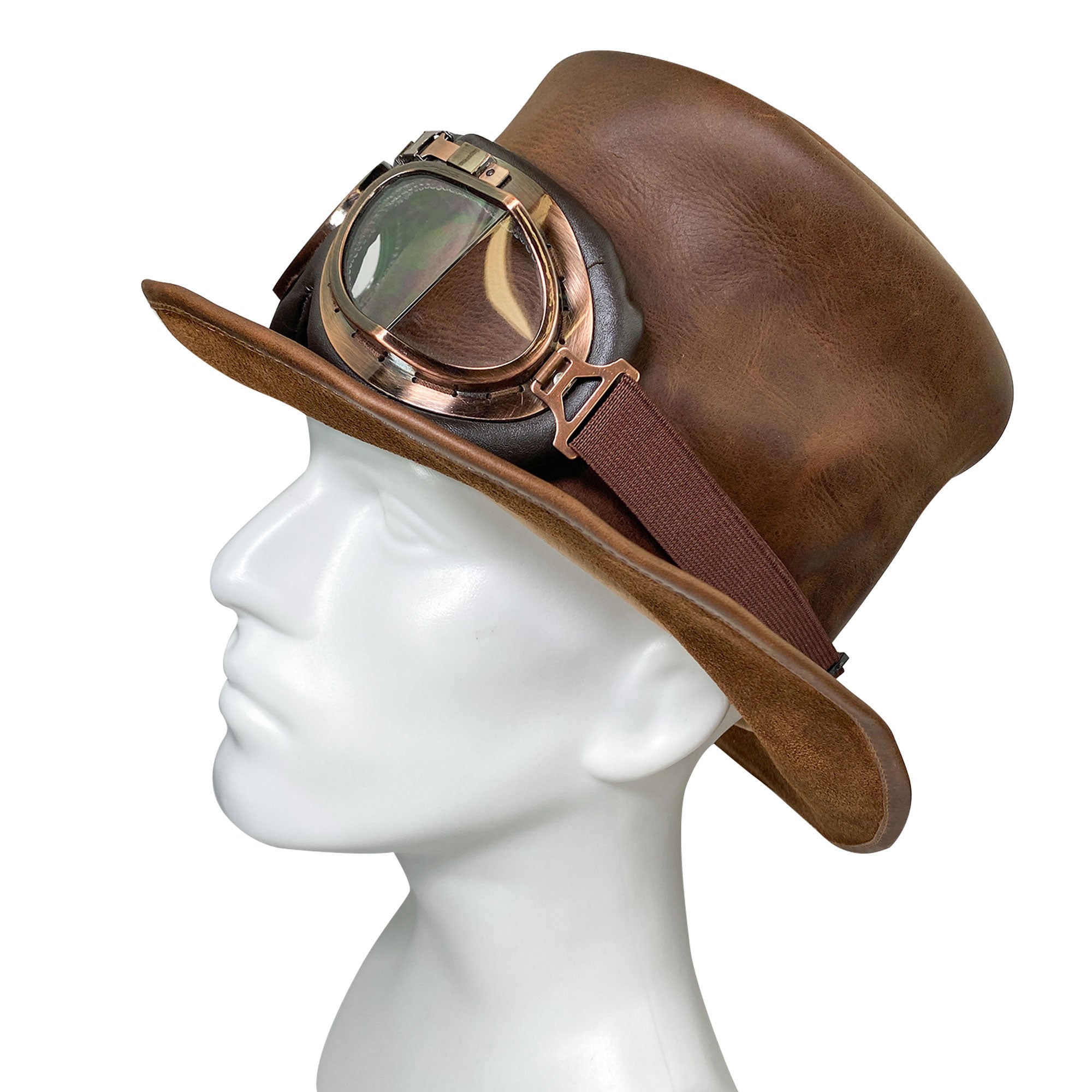 An elegant side profile of the Hide & Play Top Hat, showcasing its distinctive style paired with goggles. This Top Hat is perfect for standing out during cosplay, Halloween, performances, films, or shows. The Mad Hatter Top Hat is made from full grain leather through small batch production, hand cut, hand sewn techniques, and fire branding, showcasing artisan quality from La Antigua Guatemala and Oaxaca Mexico.