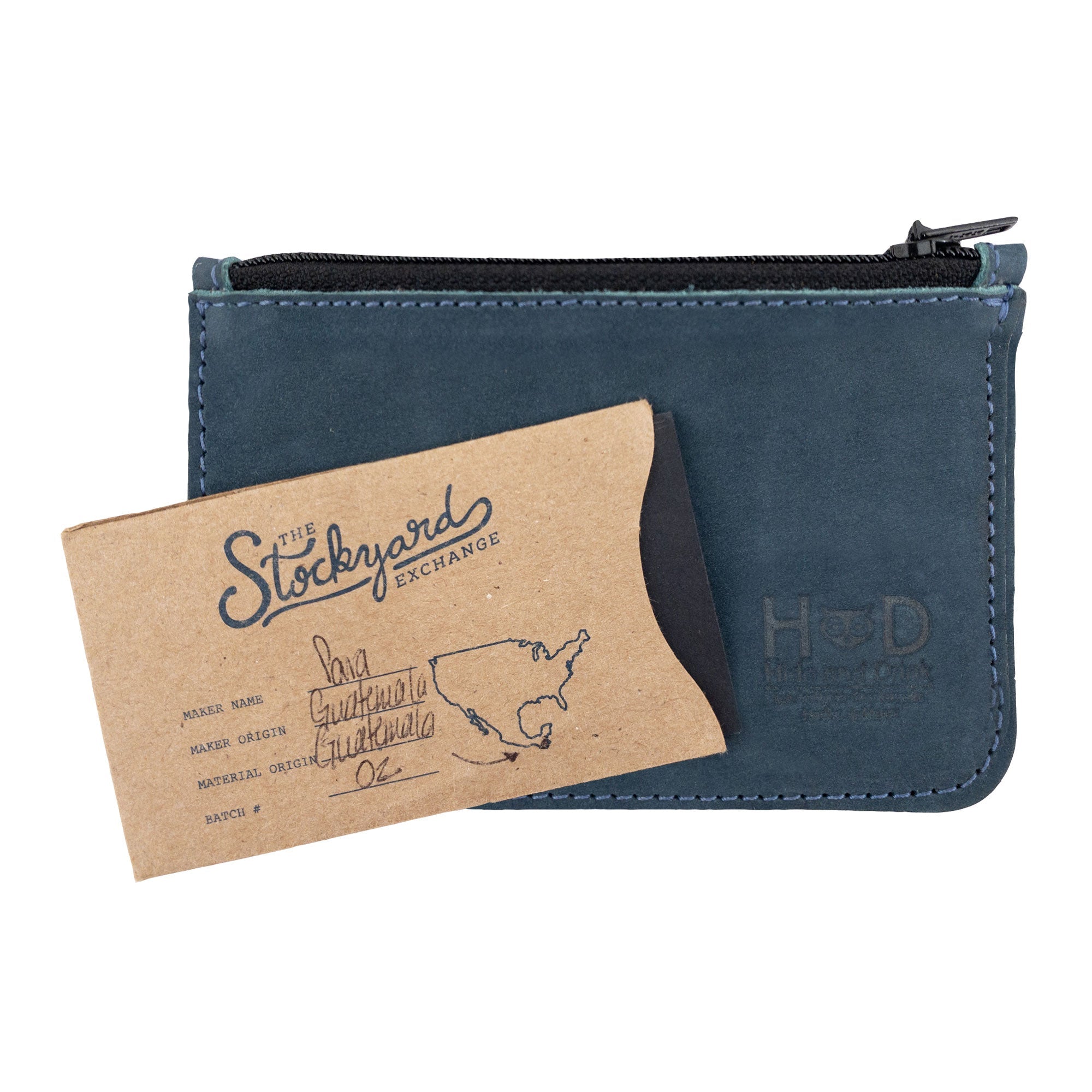 Hide & Drink Zippered Wallet next to a business card, showcasing its versatility as a card case. Crafted from Full Grain Leather, it's perfect for organizing coins and folded bills, representing artisan craftsmanship from La Antigua Guatemala & Oaxaca Mexico.