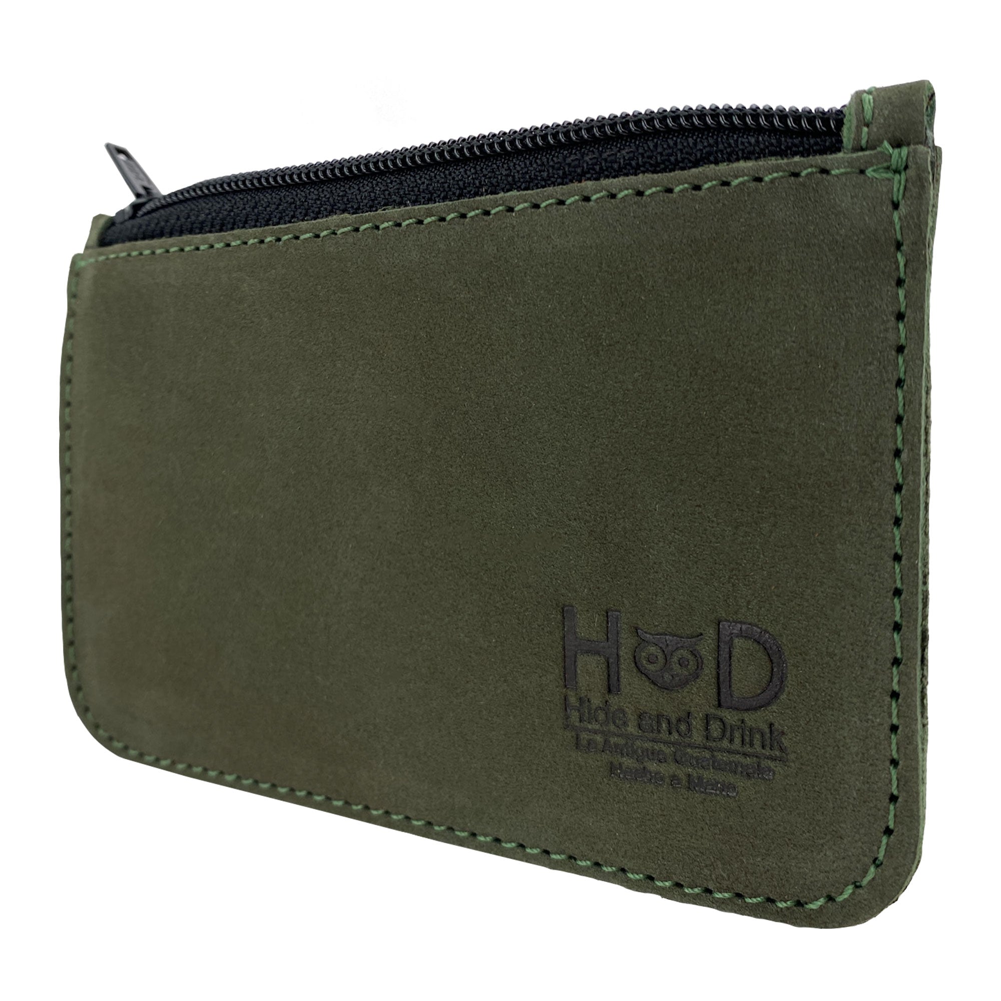 Side angle of Hide & Drink Zippered Wallet, demonstrating its sleek design and practical use as a Coin Organizer. This wallet is crafted from Full Grain Leather in a small batch production setting in La Antigua Guatemala and Oaxaca, Mexico.