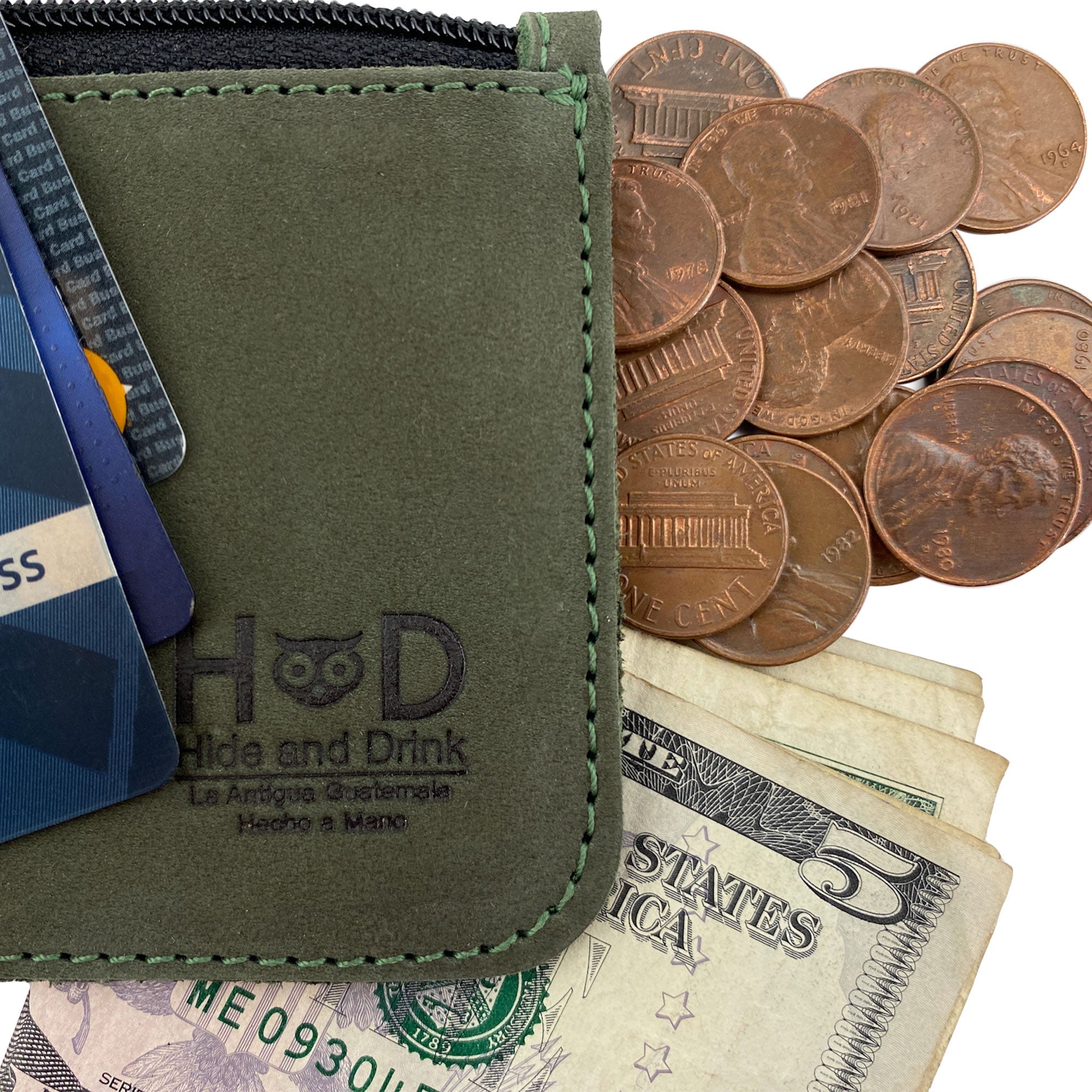 Measurement illustration of Hide & Drink Zippered Wallet, highlighting its size and perfect fit for cards and cash. This Full Grain Leather wallet is artisan-crafted in La Antigua Guatemala & Oaxaca Mexico, making it a favorite travel accessory.