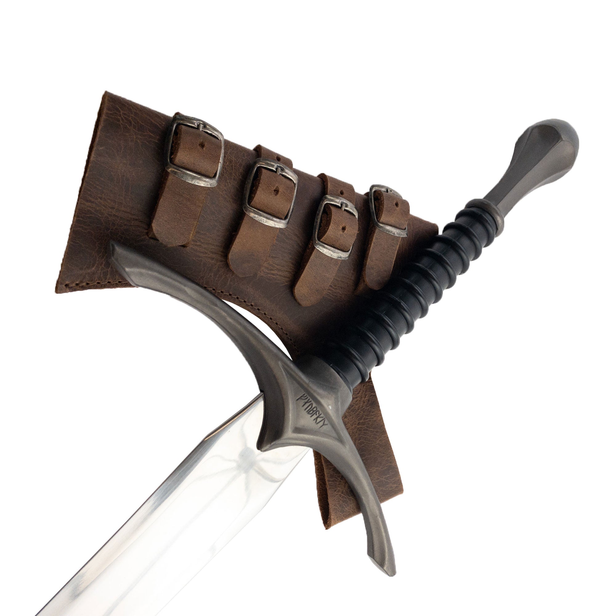 The sword resting against the Sword Frog Leather Holder by Hide & Play, illustrating its practical application for costumes and cosplay. Handmade from full grain leather, this unique piece represents artisan quality with small batch production methods in La Antigua Guatemala & Oaxaca Mexico.