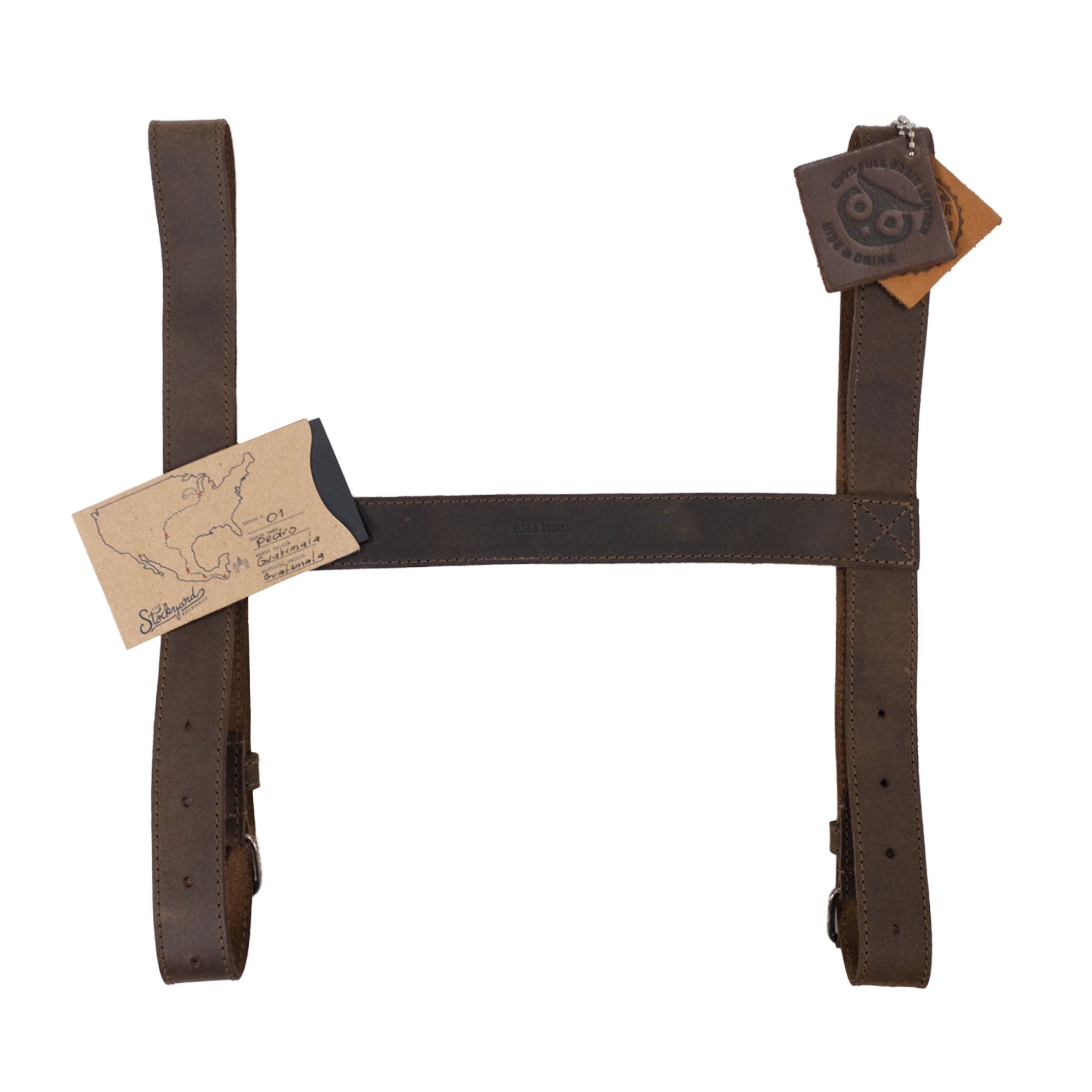 Functional Blanket Carrier by Hide & Drink, designed with adjustable straps and made from durable Full Grain Leather, great for camping and travel, showcasing small batch production and artisan craftsmanship from La Antigua Guatemala & Oaxaca Mexico.