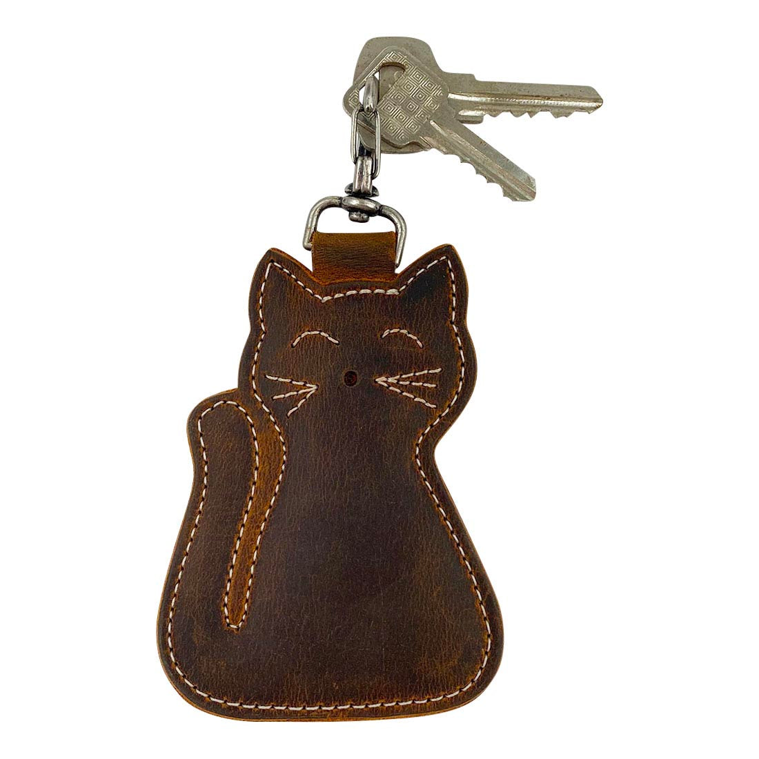 Cute Cat Keychain by Taco Dog with a beautiful rustic appearance, designed as a functional and durable key holder. Made from full grain leather, this lightweight kitten key holder exemplifies artisan small batch production with hand cut and hand sewn details, proudly handmade in La Antigua Guatemala.