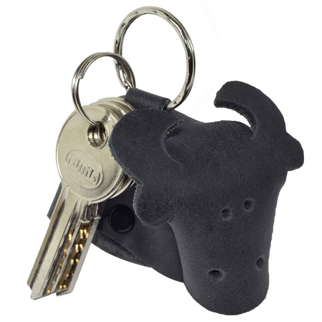Elegant Full Grain Leather Animal Key Chain from Hide & Drink, designed as a cute cow. This appealing Critter Keychain acts as both a fob charm and an animal key holder charm pendant, crafted with care in La Antigua Guatemala, reflecting artisan small batch quality.