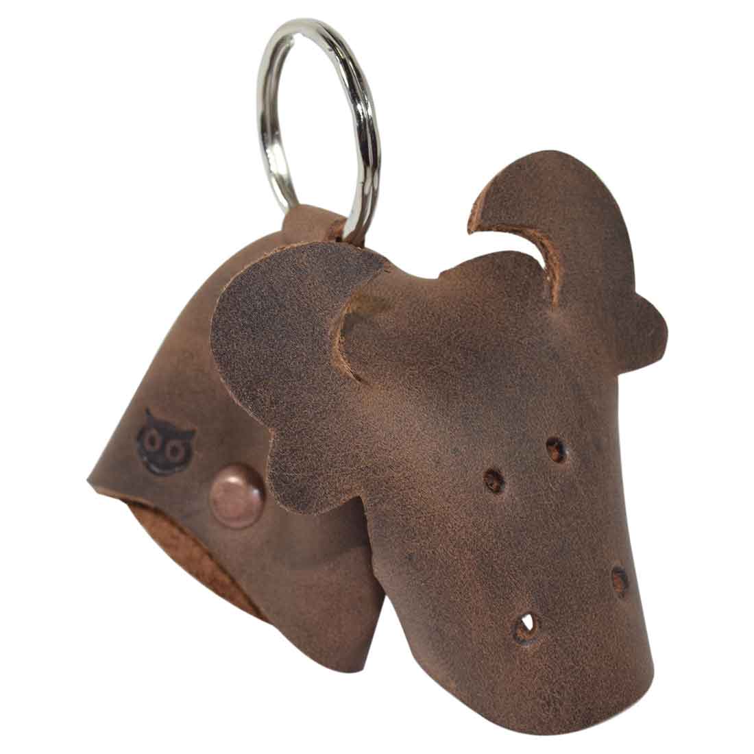 Stylish Full Grain Leather Animal Key Chain from Hide & Drink, featuring a cute cow design. This artisan-crafted Critter Keychain serves as a charming fob and animal key holder charm pendant, made from soft durable leather. Hand cut and sewn in La Antigua Guatemala, embodying small batch production artistry.