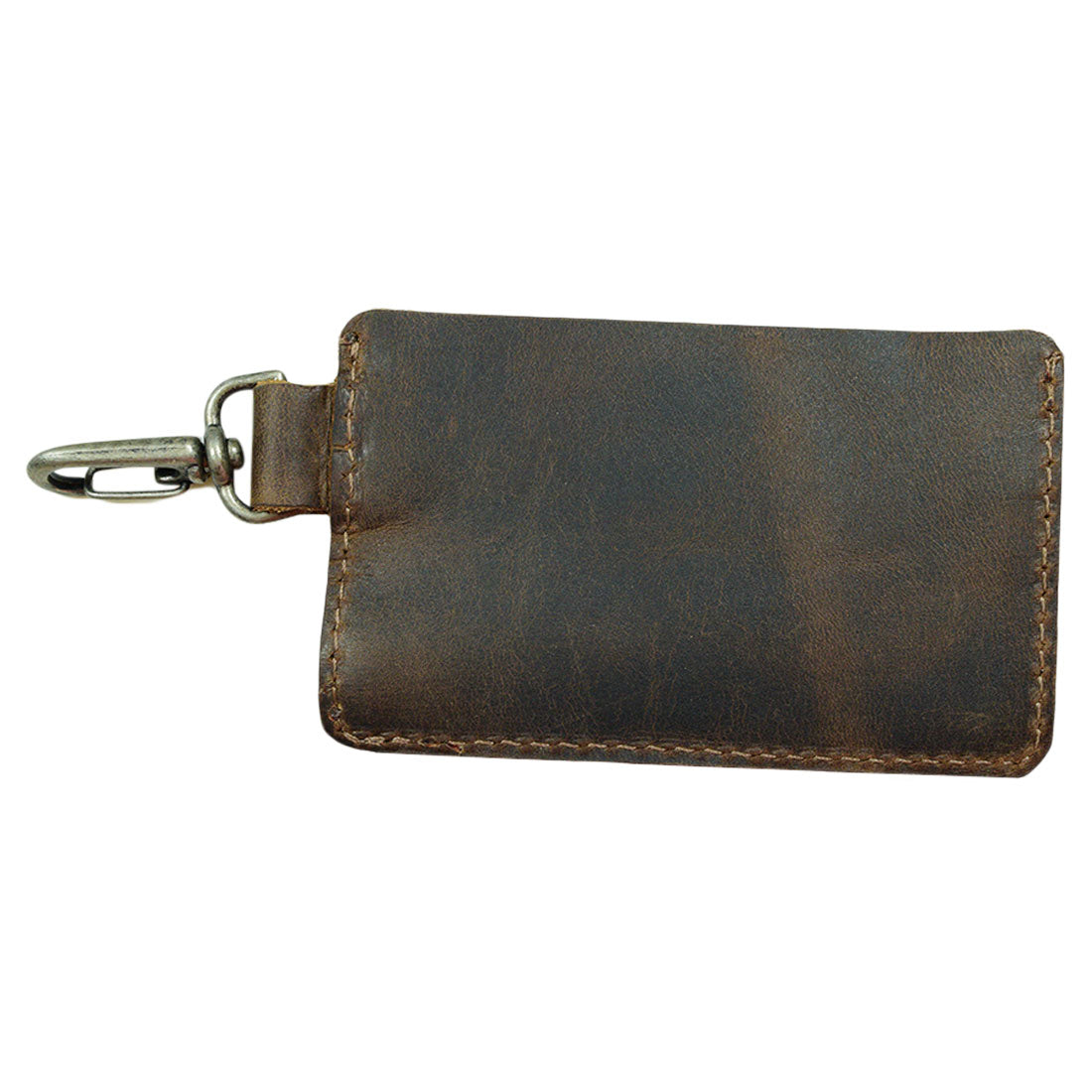 Back view of Hide & Drink's Leather Card & Key Holder, showcasing its sleek design. This organizer holds up to 4 cards and functions as a practical Keychain Organizer. Made of high-quality Full Grain Leather, the piece reflects artisan artistry through small batch production, hand cut and hand sewn by skilled craftspeople in La Antigua Guatemala & Oaxaca Mexico.