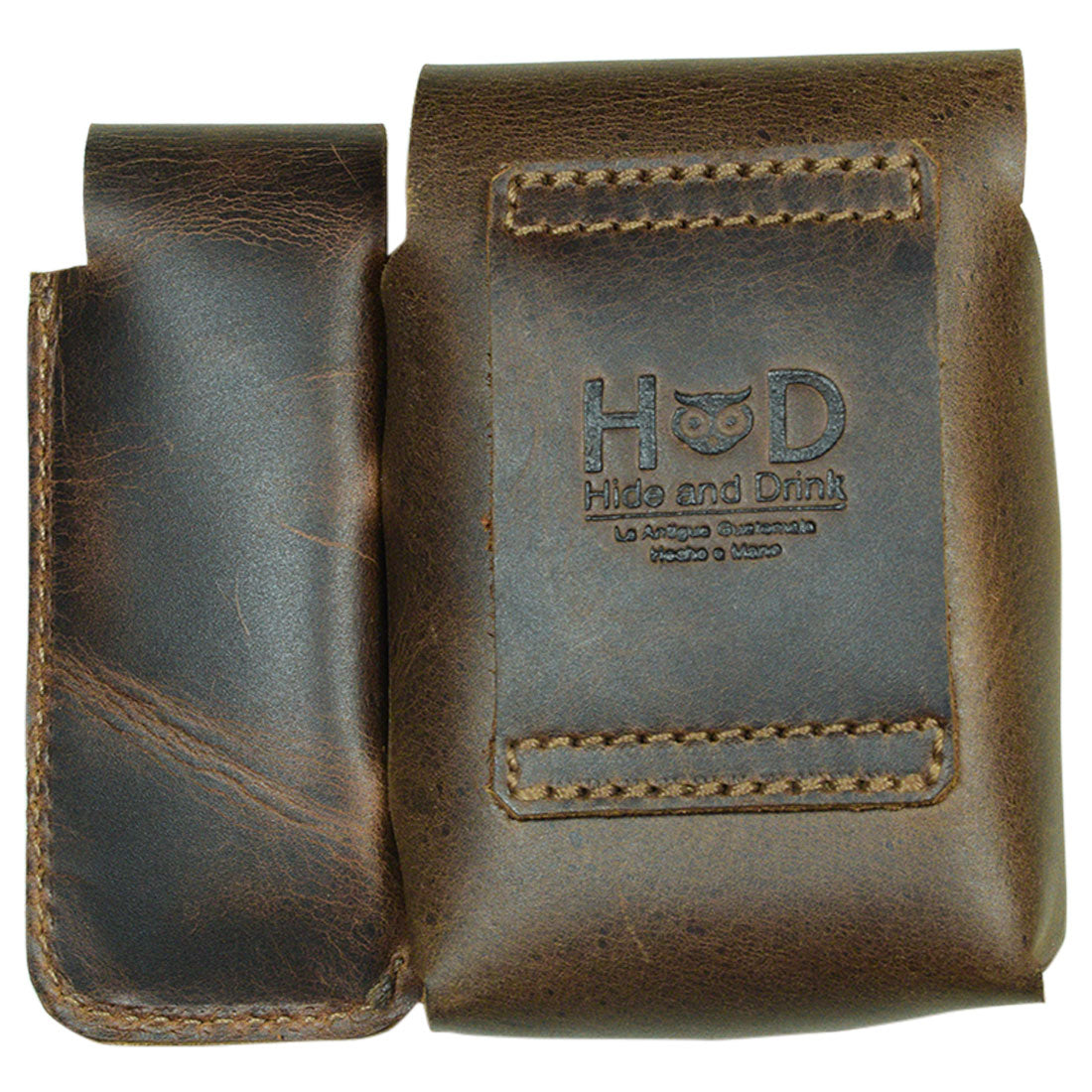 Rivet Cigarette Case by Hide & Drink, highlighting the back side with a unique logo and elegant leather finish. This practical piece acts as a Tobacco Case, perfect for smoking accessories. Stunningly crafted from Full Grain Leather in small batch production, handmade in La Antigua Guatemala & Oaxaca Mexico.