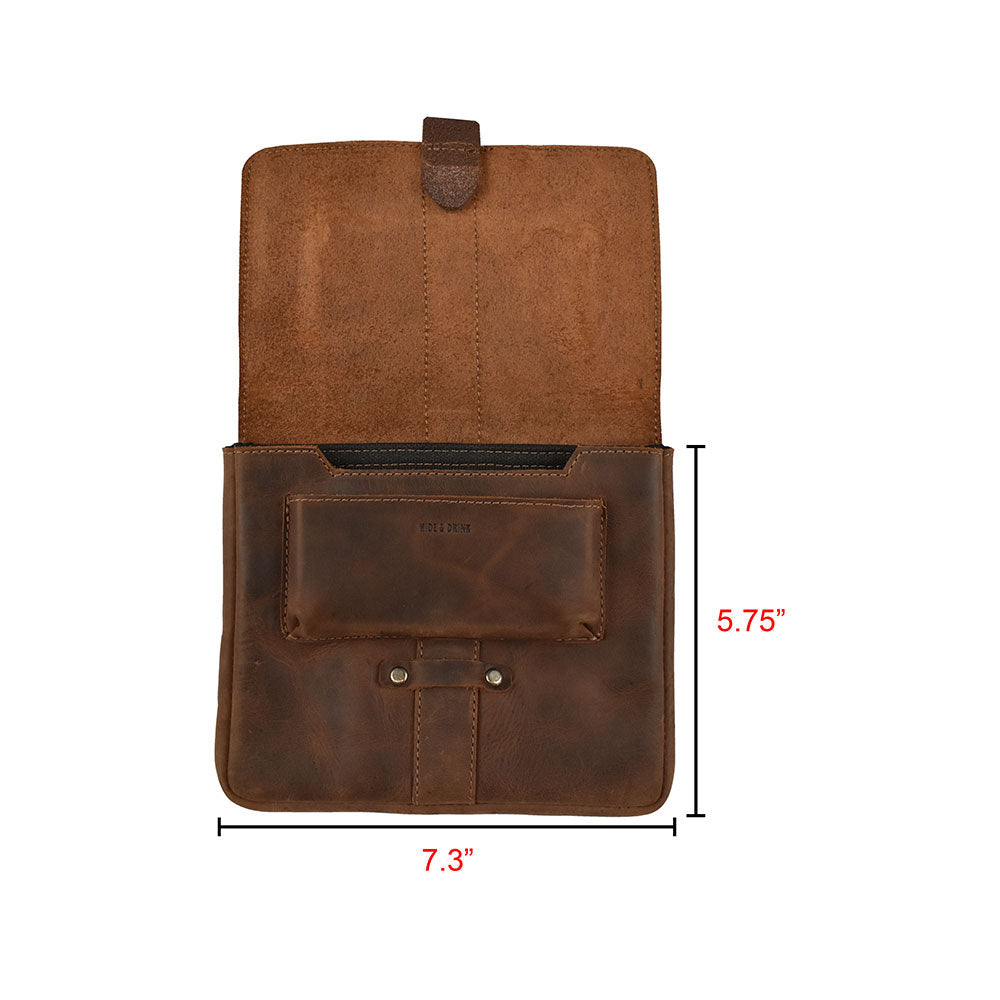 Dimensions of the Kindle Oasis Sleeve by Hide & Drink displayed, emphasizing its perfect fit for tablets. This practical Tablet Sleeve and Protector Cover is crafted from premium full grain leather, embodying artisan craftsmanship.