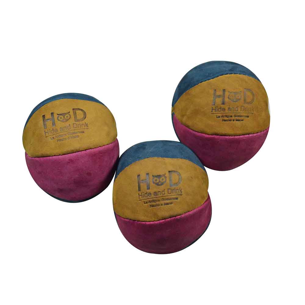 Brightly colored Hide & Drink Leather Juggling Balls (3-Pack) showcasing vibrant design. Full Grain Leather Juggling Balls Set of 3, made with Small Batch Production, Hand Cut, Hand Sewn, and Fire Branded by skilled Artisans. Handmade in La Antigua Guatemala & Oaxaca Mexico.