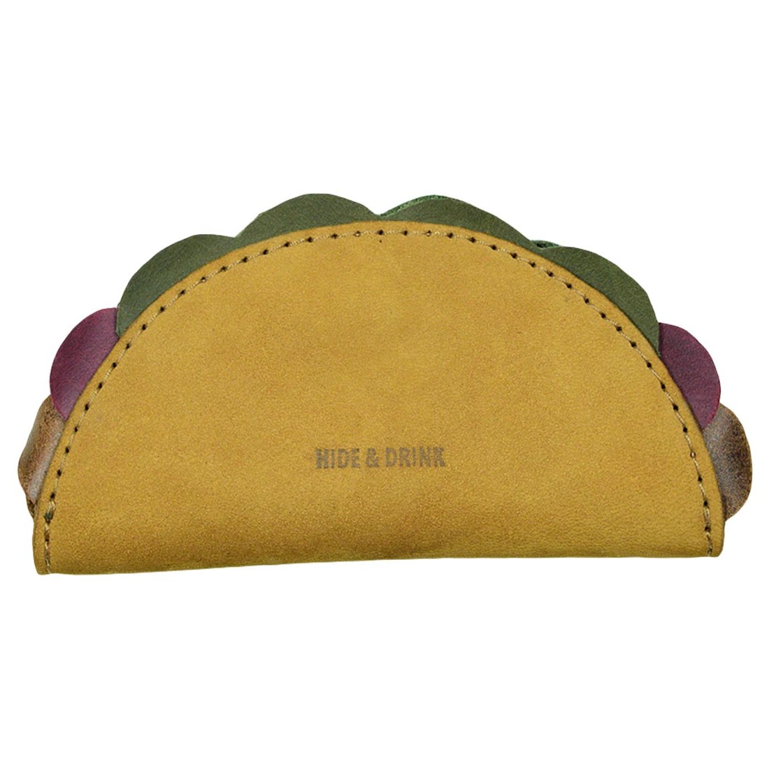 Close-up of the Taco Cord Keeper by Hide & Drink, highlighting its rustic leather design and vibrant colors. This Taco Cord Keeper serves as an adorable cable organizer and earphone holder, perfect for anyone who loves stylish organization in Full Grain Leather.