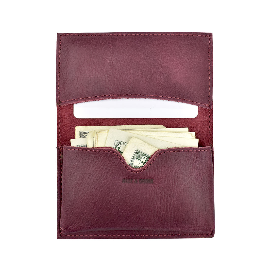 Back view of Hide & Drink's Vintage Card Holder, displaying detailed craftsmanship in this earthy leather finish. Ideal as a cash organizer and business card holder, this wallet is handmade through small batch production in La Antigua Guatemala & Oaxaca Mexico.